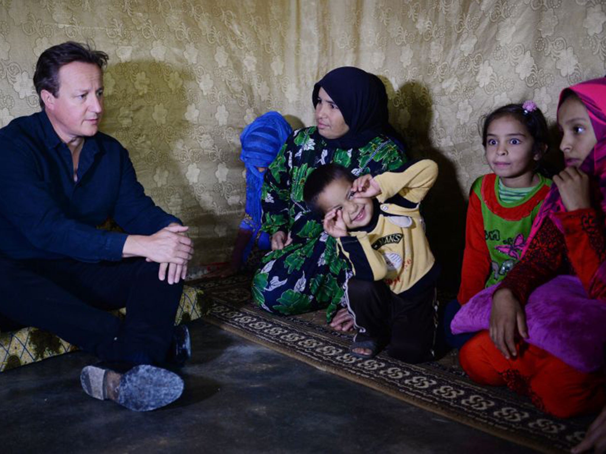 David Cameron visited Syrian refugee families at a camp in the Bekaa Valley on Monday