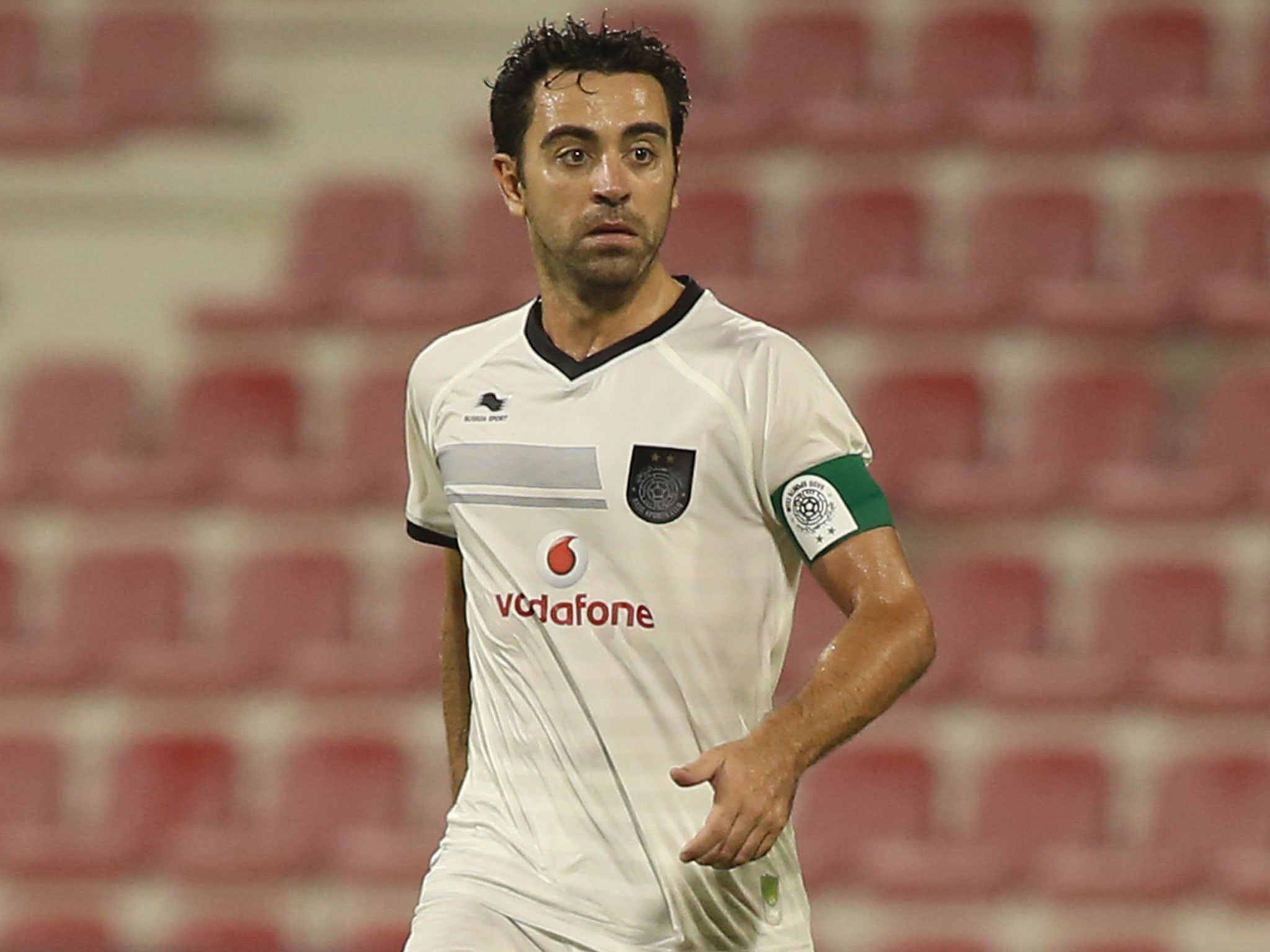 Xavi in action for Al Sadd