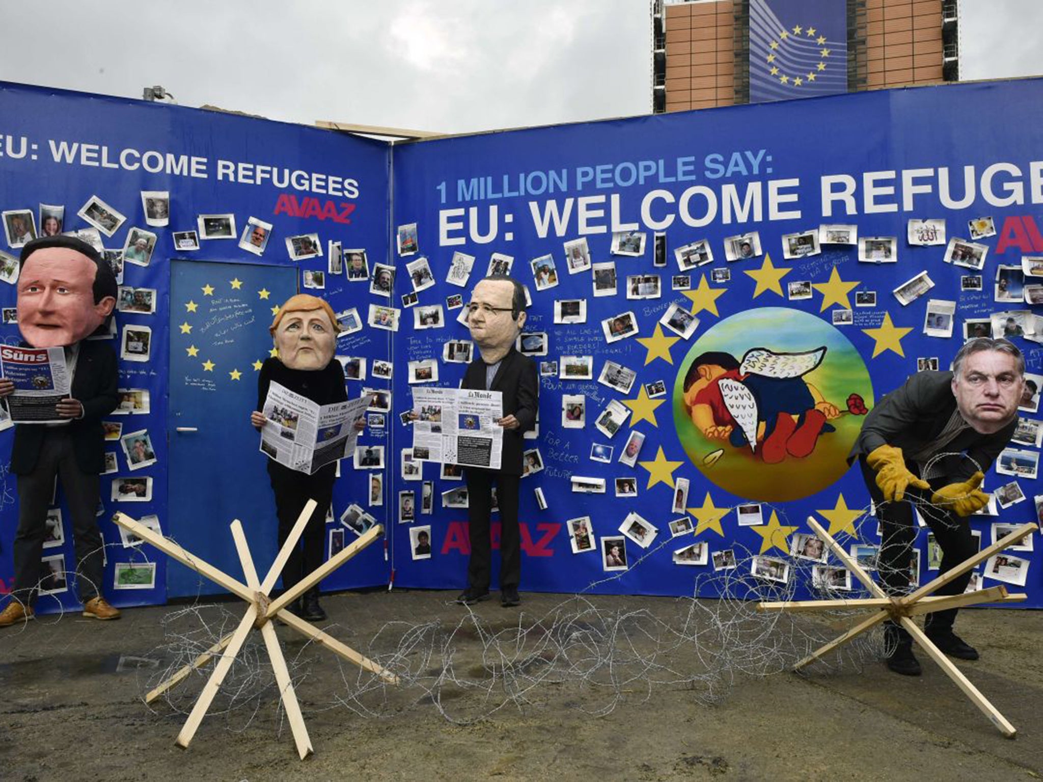 Members of the global civic organization Avaaz performing a satirical sketch in front of the EU headquarters in Brussels