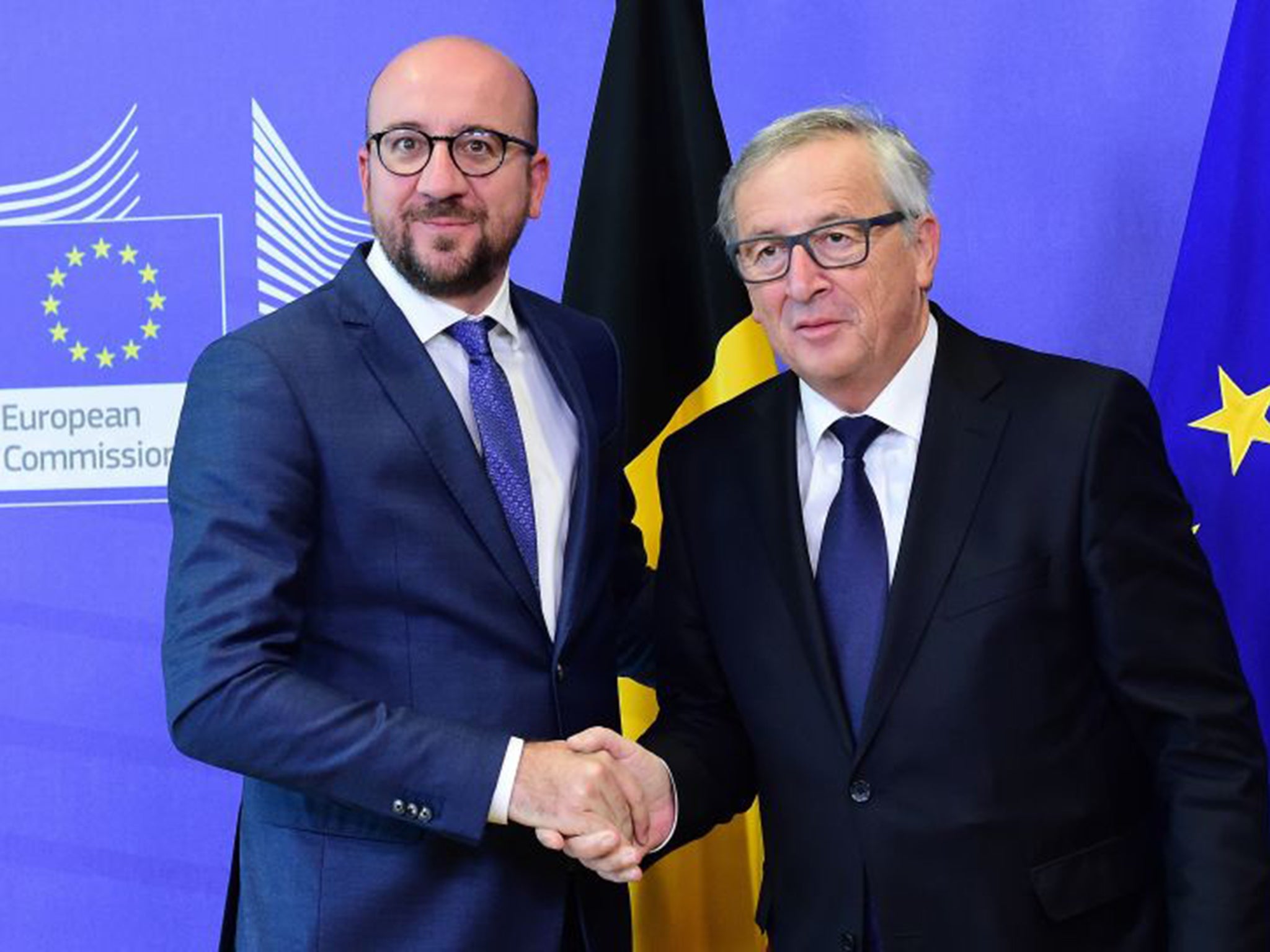 European Commission President Jean-Claude Juncker, right, pleaded with ministers to agree on quotas