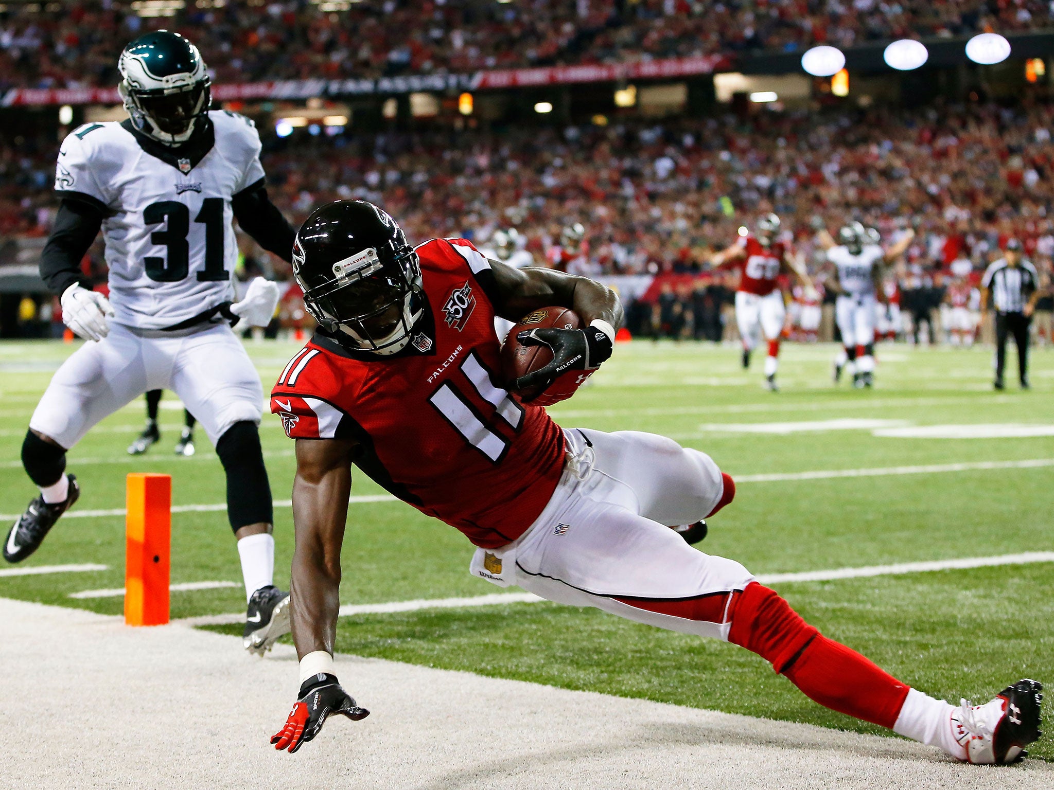 Julio Jones catches a touchdown pass during Atlanta's 26-24 victory over Philadelphia