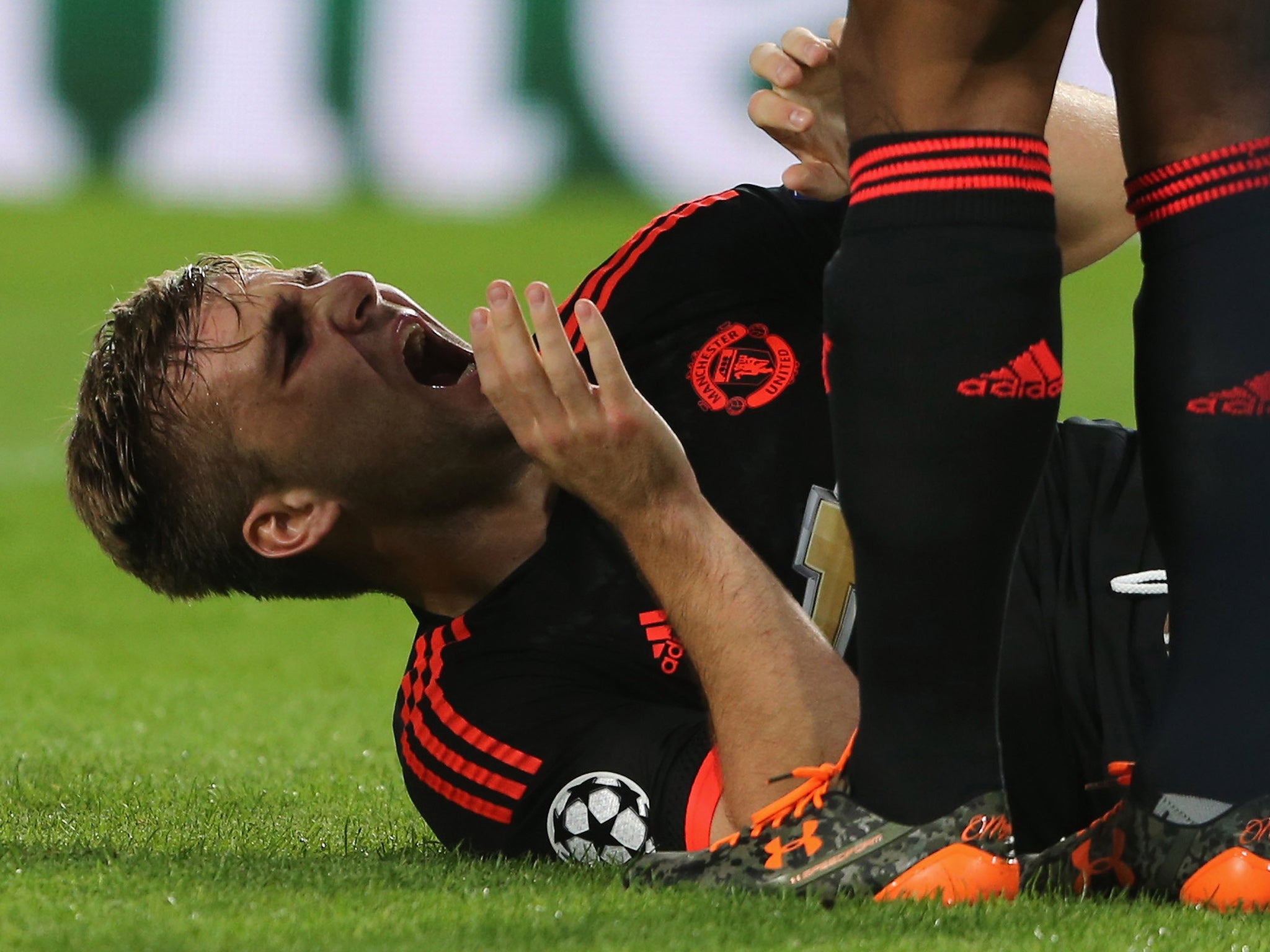 Luke Shaw reacts in agony after the incident