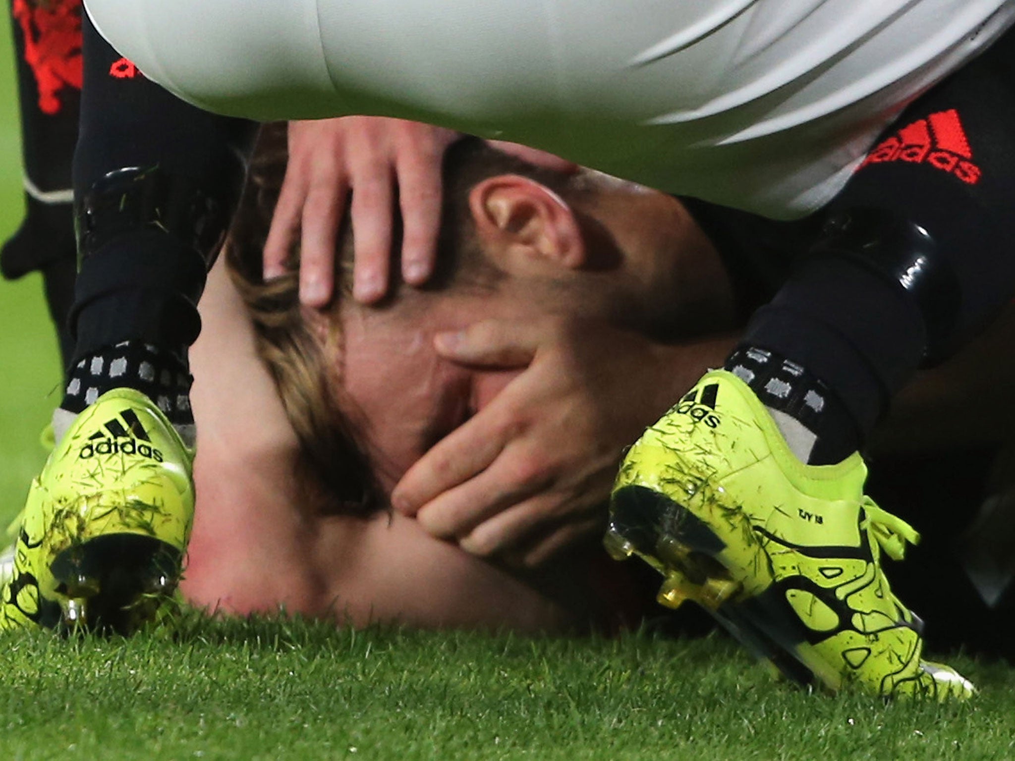 Luke Shaw winces in agony after suffering a broken leg