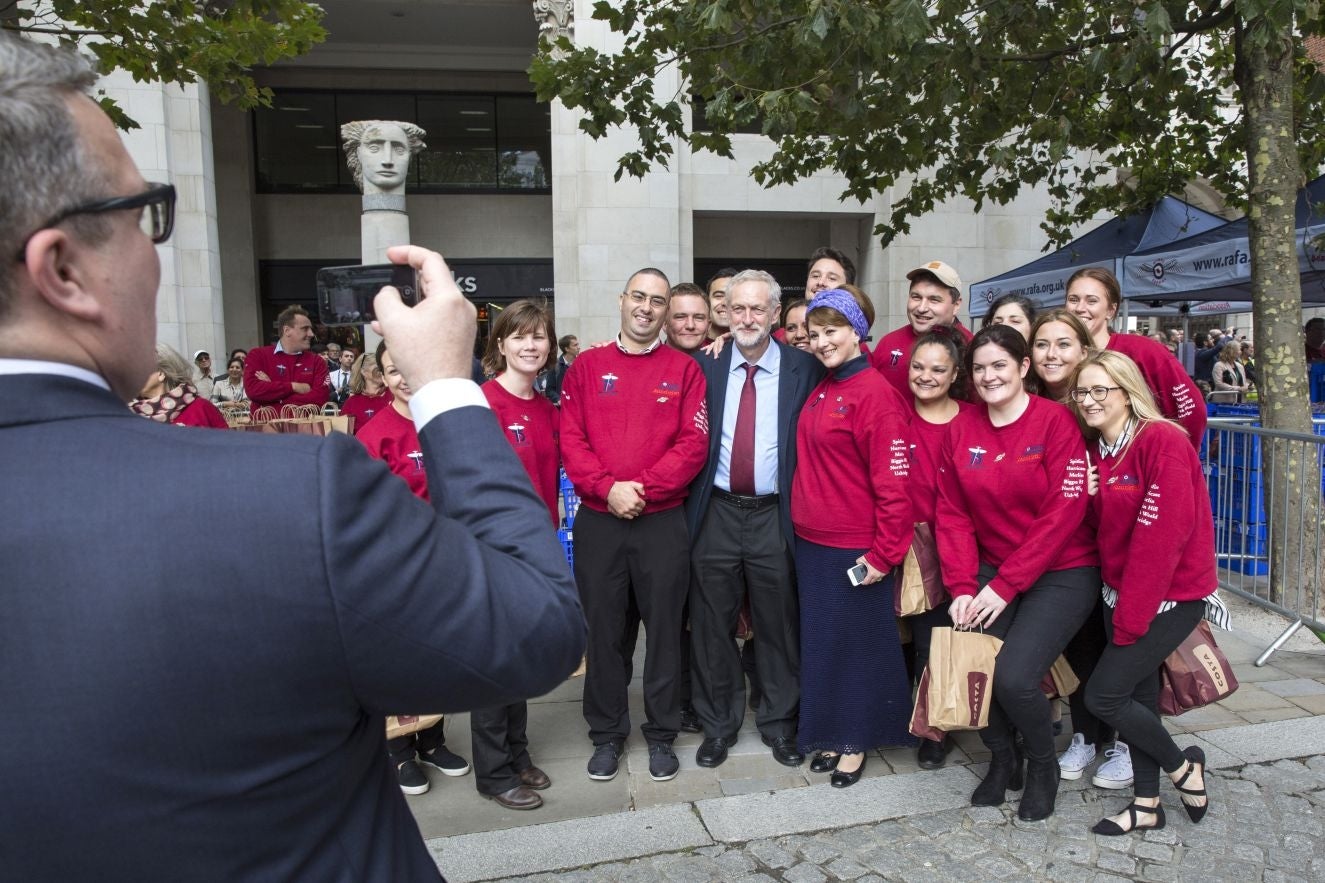 The volunteers posed for photos with Mr Corbyn