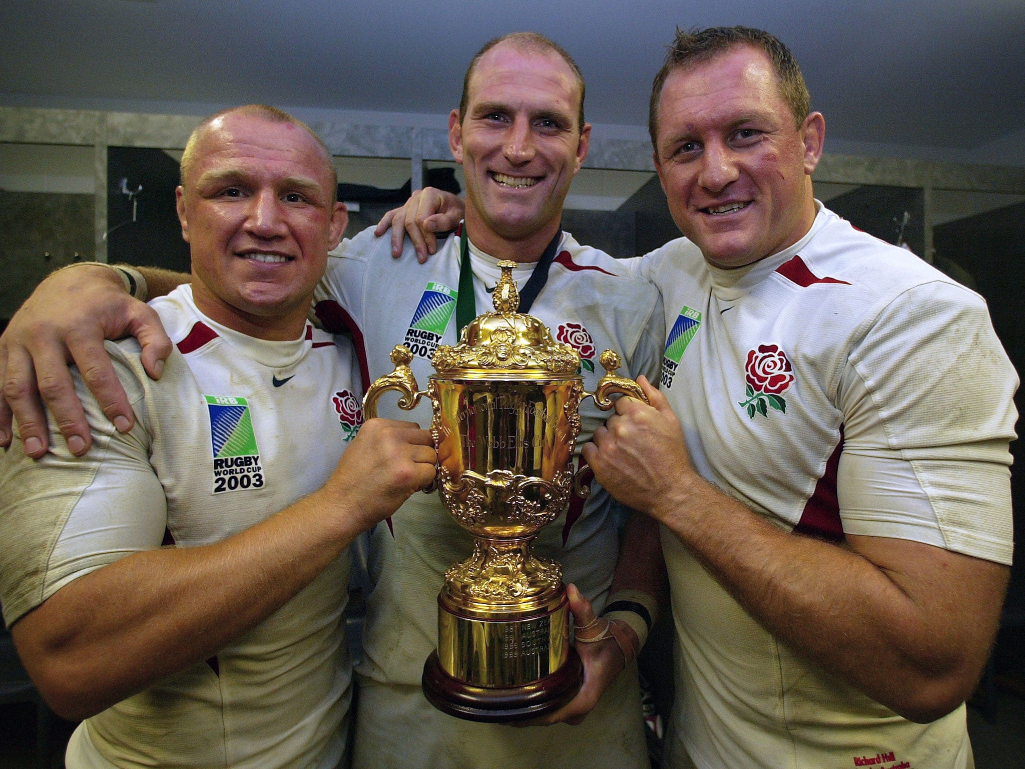 Neil Back, Dallaglio and Richard Hill with the William Webb Ellis trophy after the 2003 Rugby World Cup success