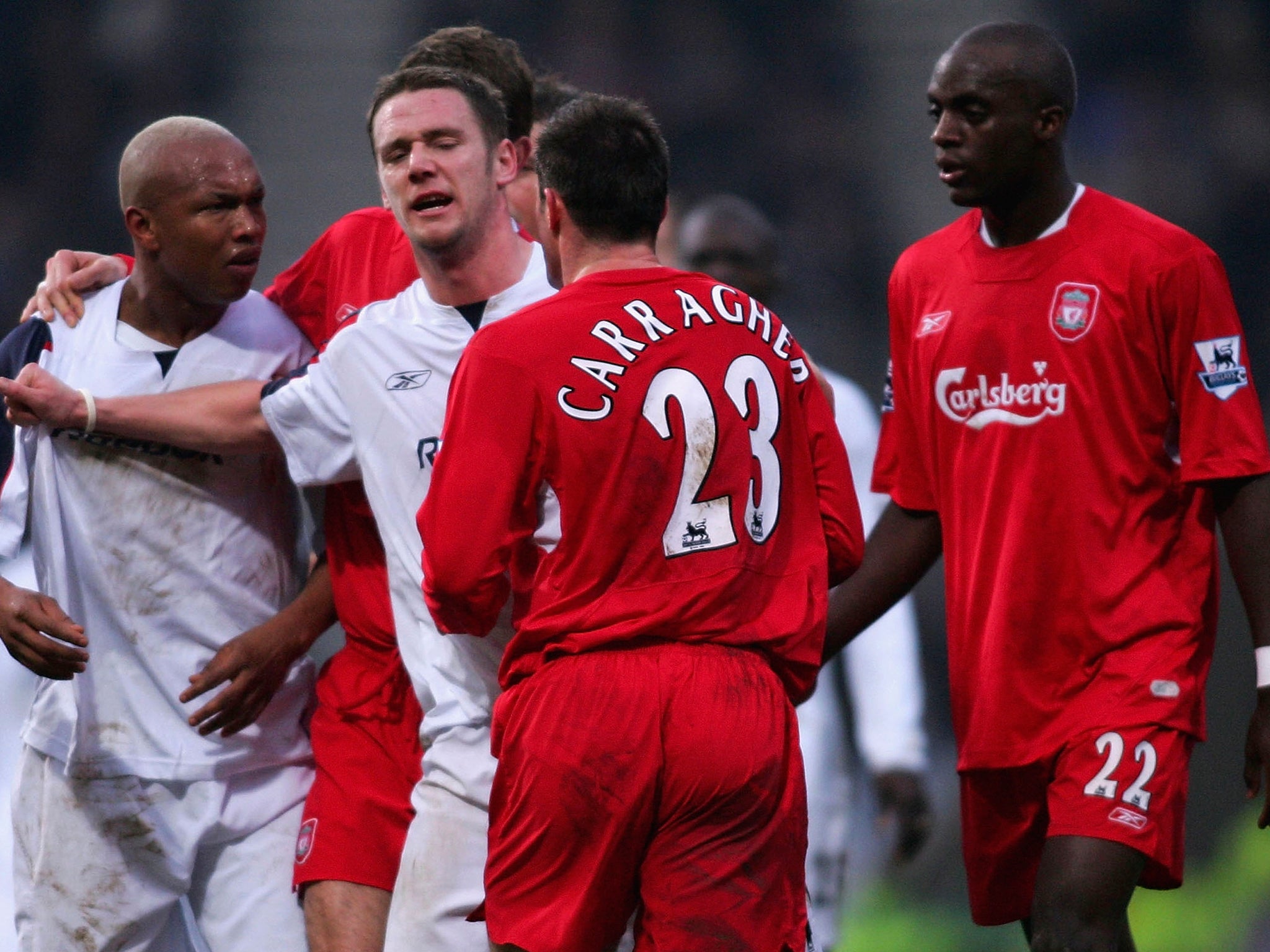 El-Hadji Diouf clashes with Jamie Carragher while playing for Bolton Wanderers