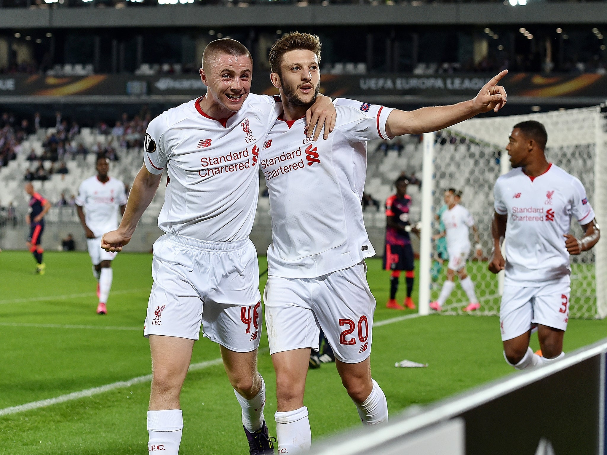 Rossiter celebrates with goal scorer Adam Lallana