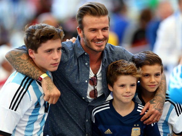 David Beckham and sons Brooklyn, Cruz and Romeo