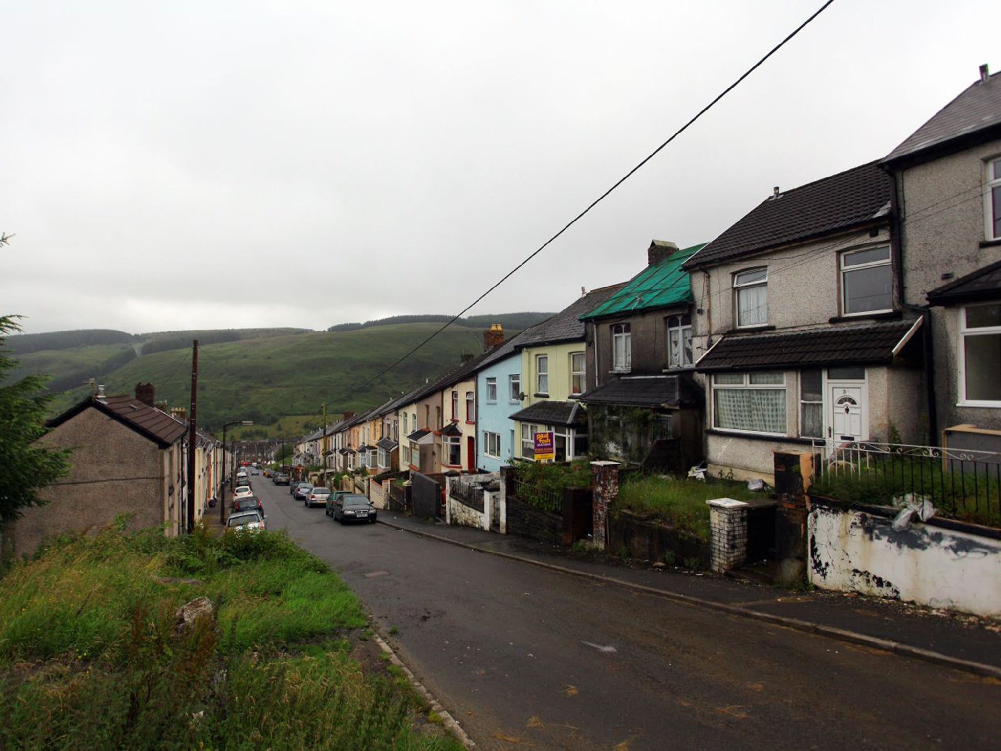Ben Mottram's new new home is just 100 yards from Oak Street, pictured, where the Independent recently found empty houses that have sold at auction for as little as £7,000