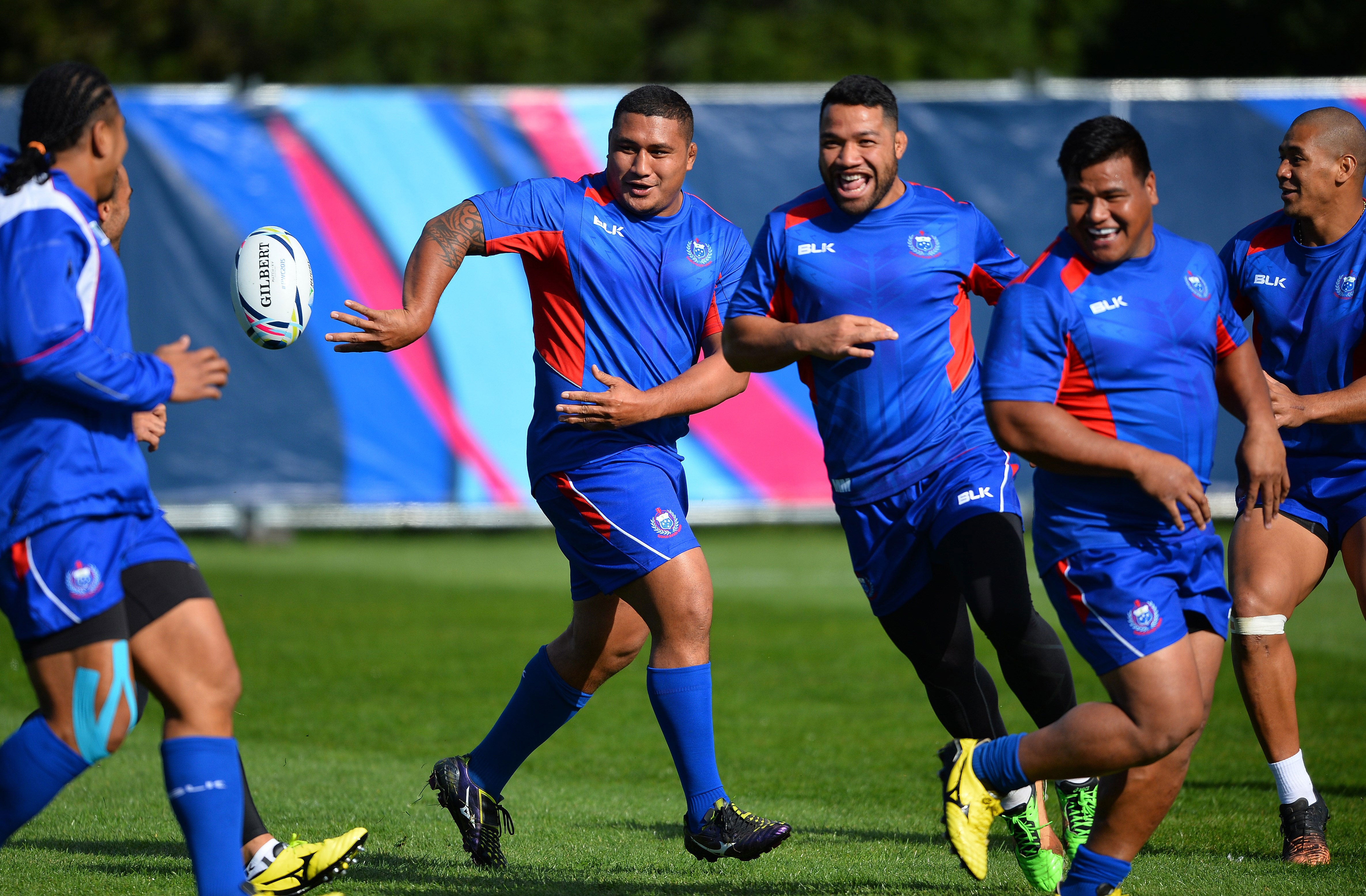 Samoa warming up for their Group B clash with USA in Brighton