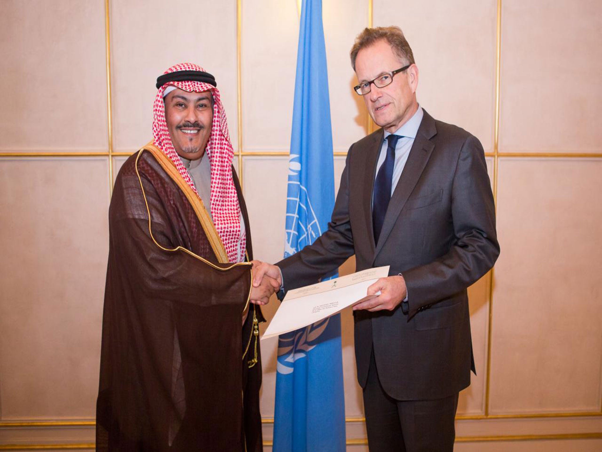 H.E. Mr. Faisal bin Hassan Trad, the Kingdom of Saudi Arabia(left), presents his credentials to Mr. Michael Møller(right), the Acting Director-General of the United Nations Office at Geneva. January 7th, 2014.