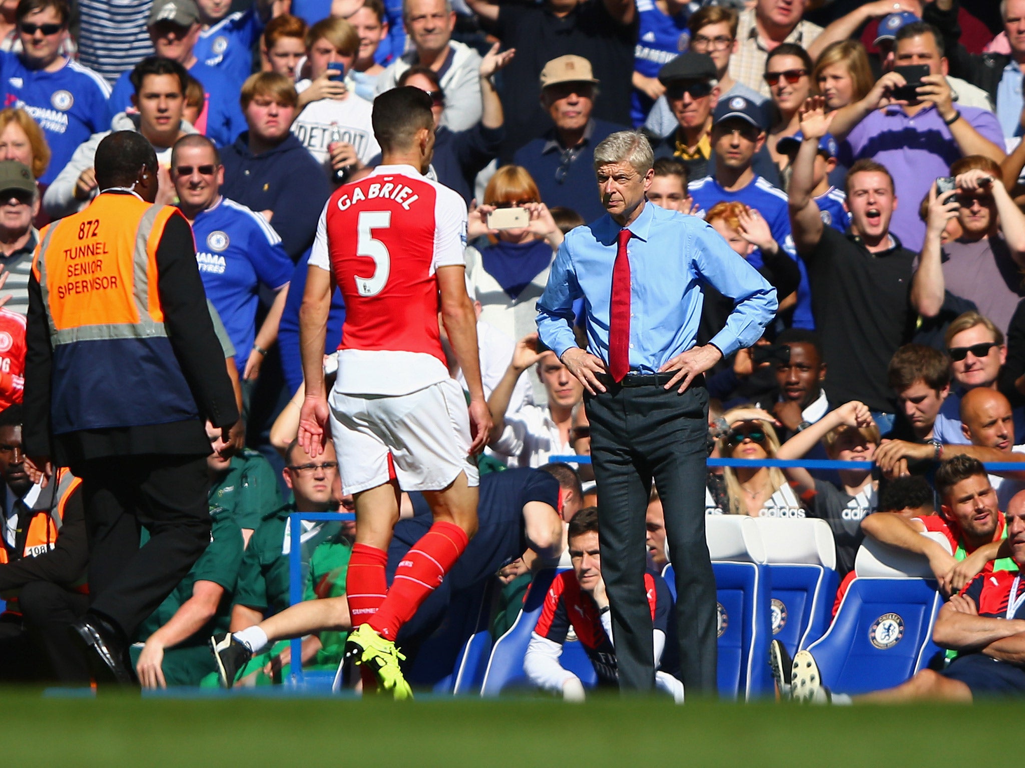 Gabriel walks off the field at Stamford Bridge