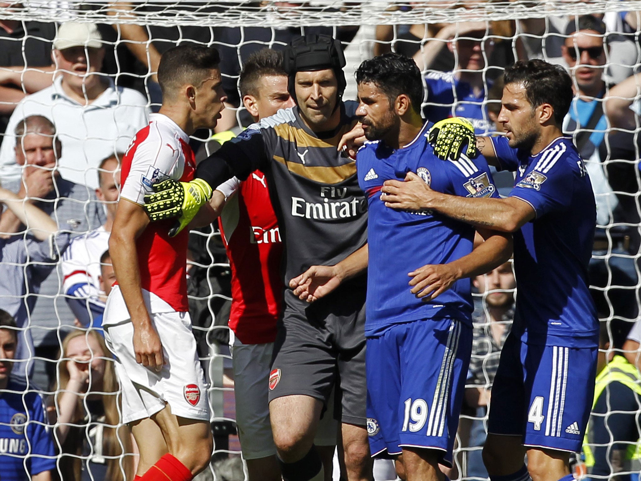 Arsenal’s Gabriel, left, squares up to Diego Costa, of Chelsea, during Saturday’s ill-tempered match