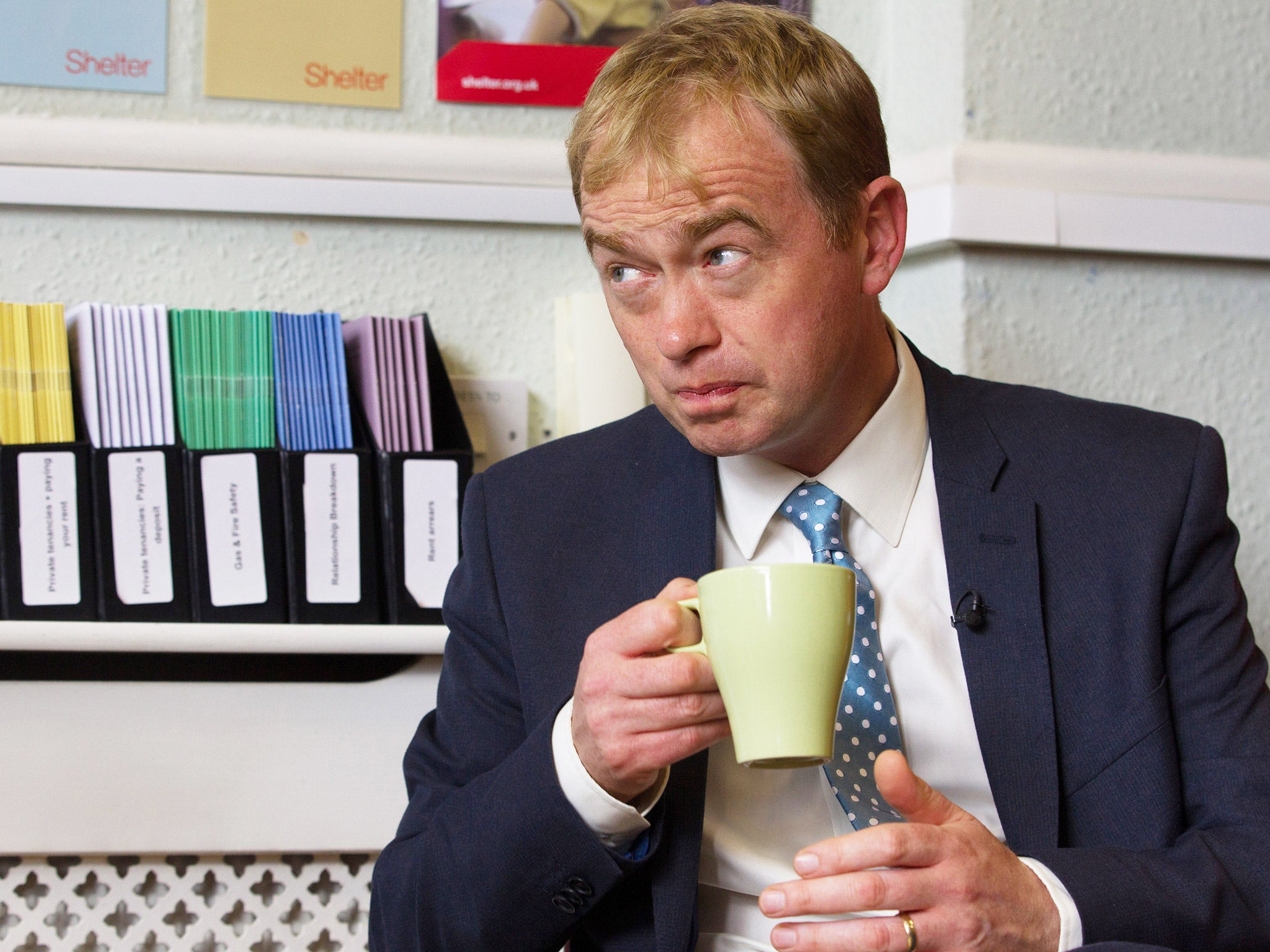 Lib Dem leader Tim Farron speaks to staff at the offices of housing charity Shelter in Bournemouth