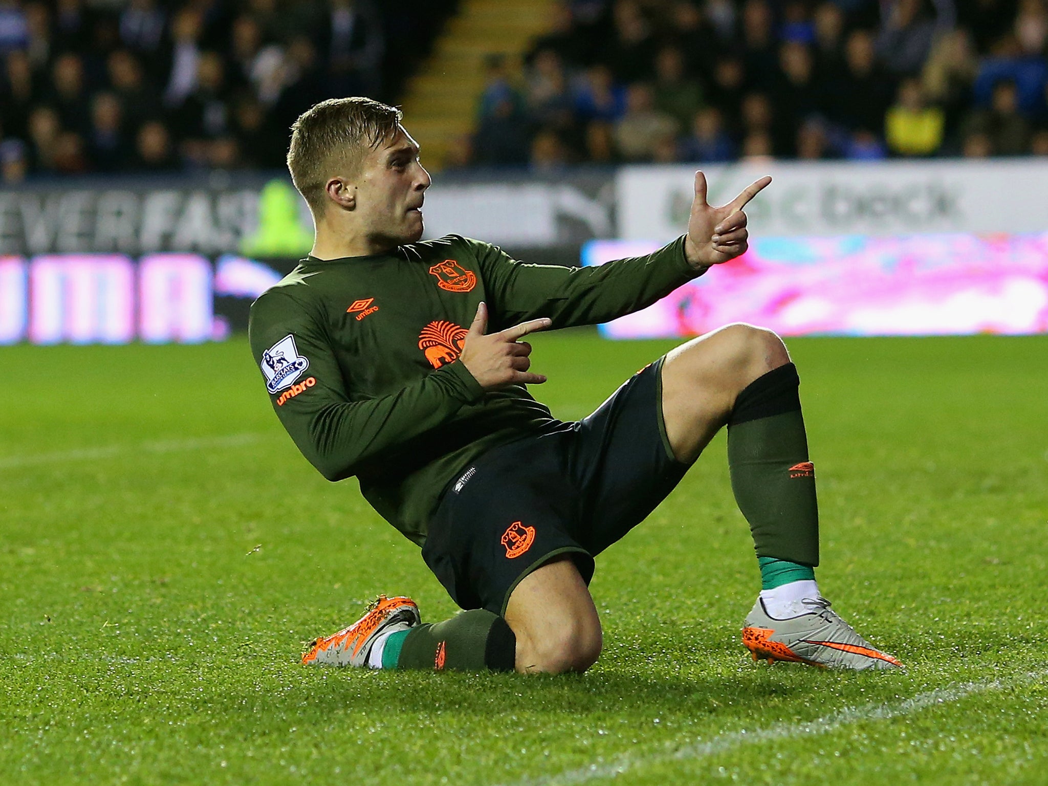 Gerard Deulofeu celebrates after scoring a curling free-kick