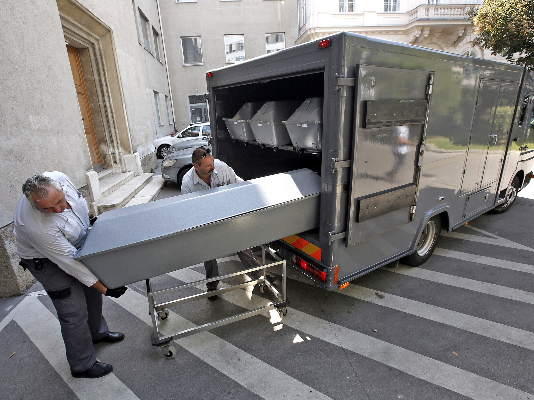 Coffins of the refugees who died in the back of a truck in Austria last month