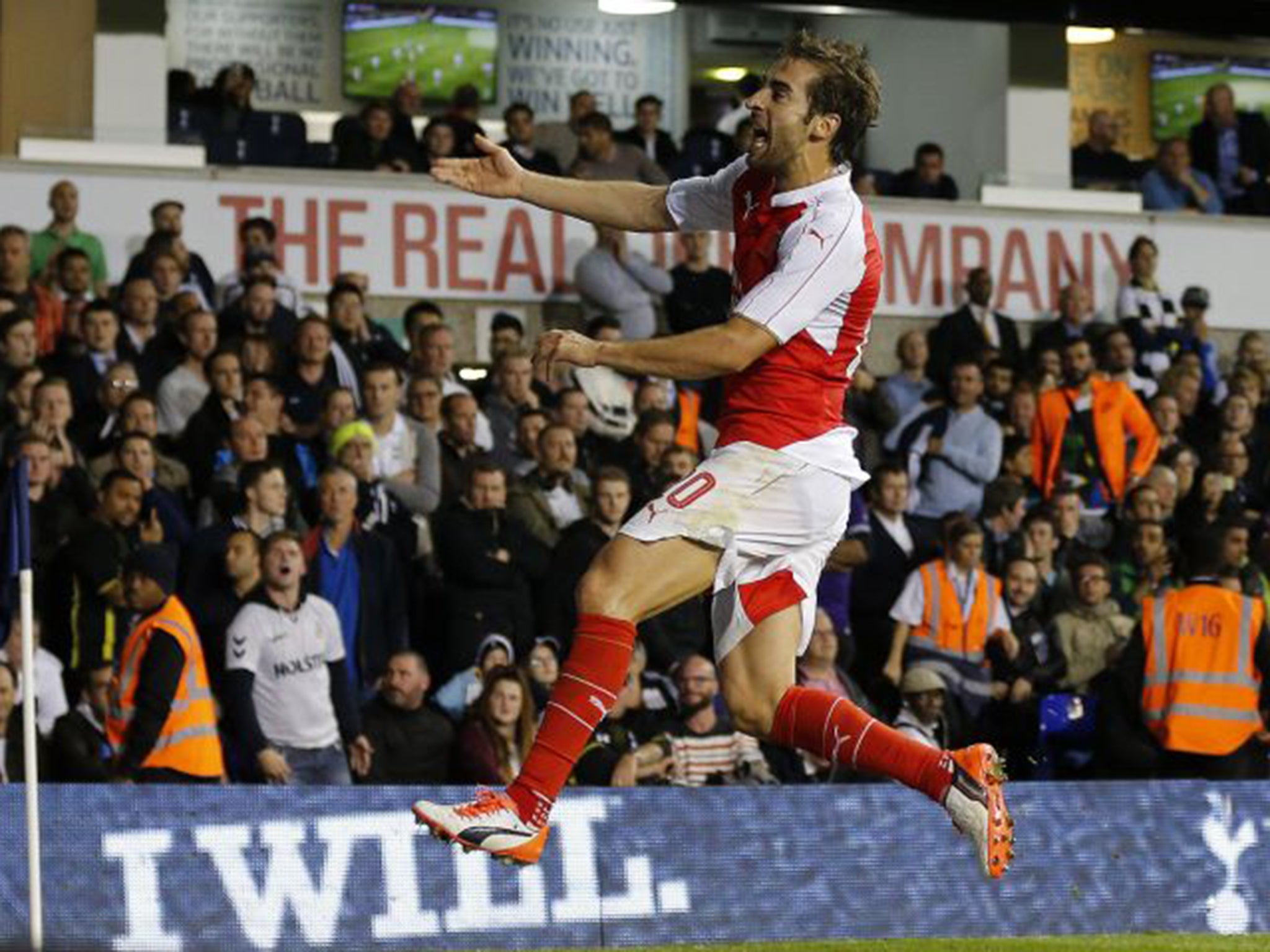 Mathieu Flamini celebrates his second against Tottenham