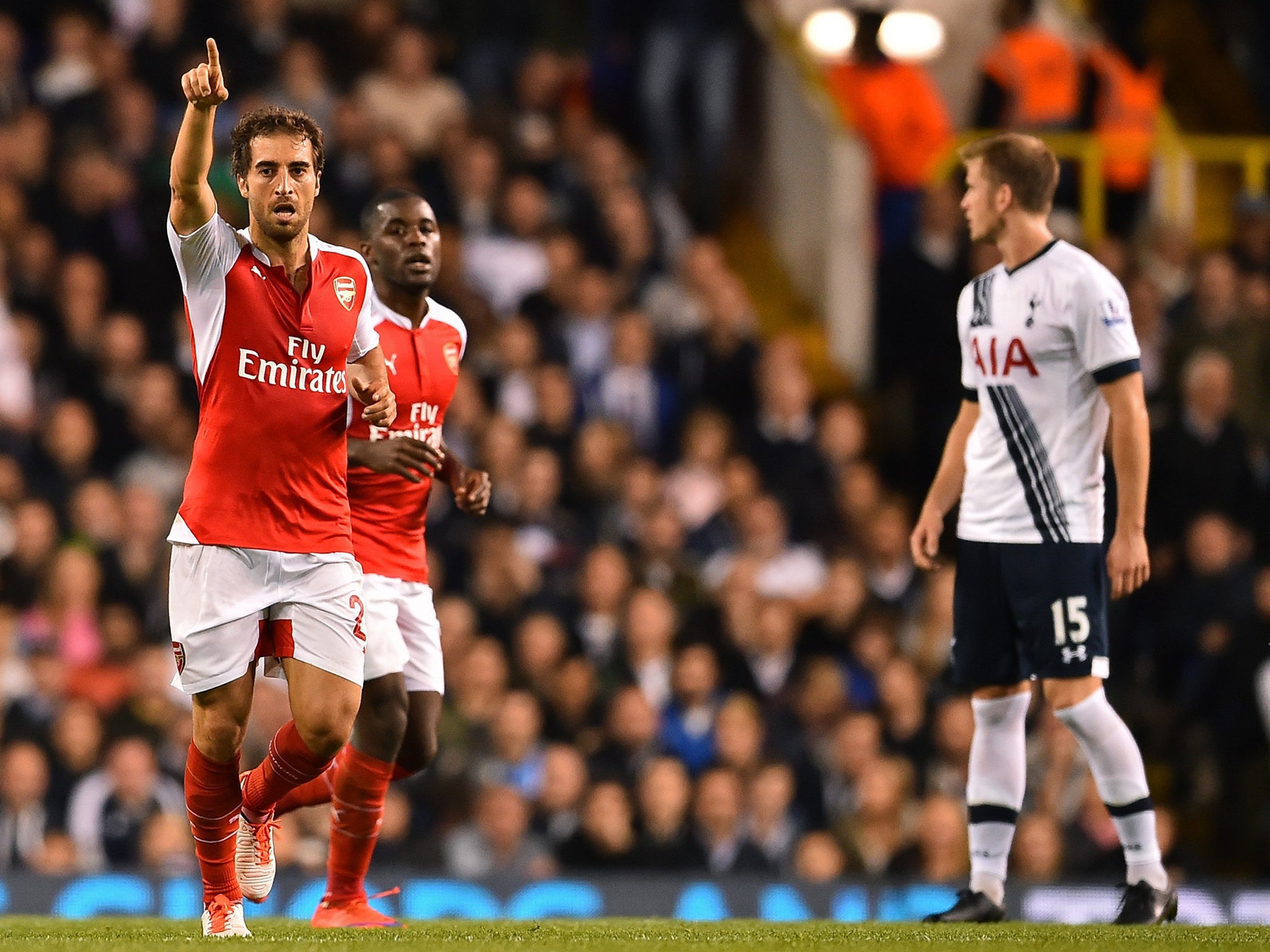 &#13;
Flamini celebrates after scoring in the north London derby&#13;