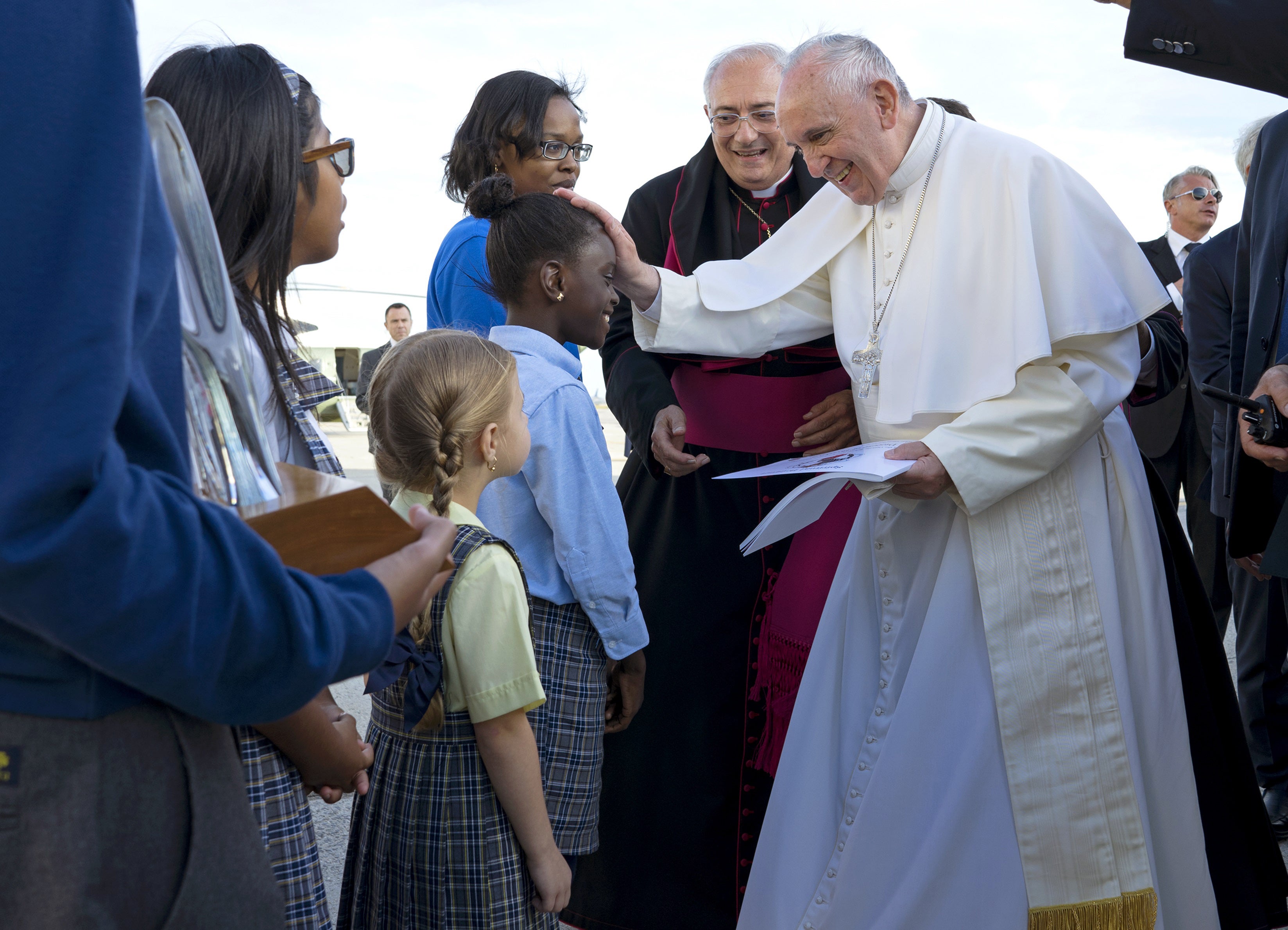 Pope Francis reaches out to 5th grader OmodeleiOjo of Brooklyn. (Reuters)