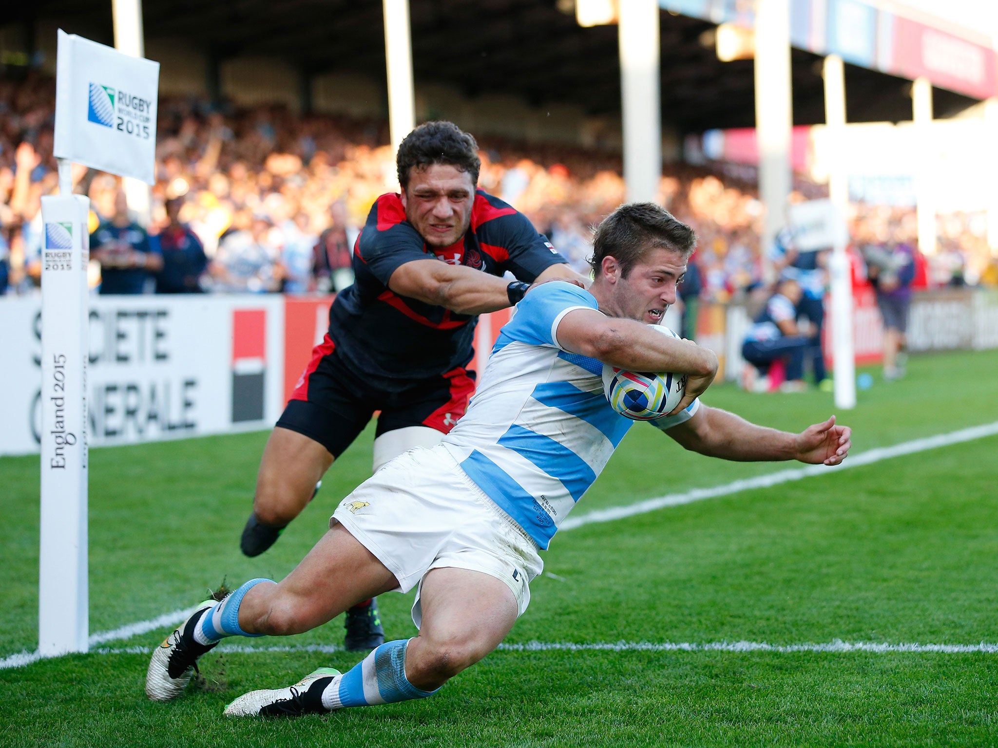 Santiago Cordero scores the second of his two tries in the corner