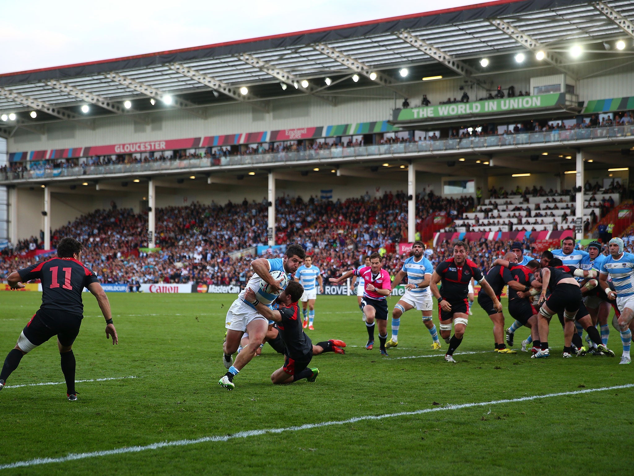 Tomas Cubelli breaks a tackle to score for Argentina