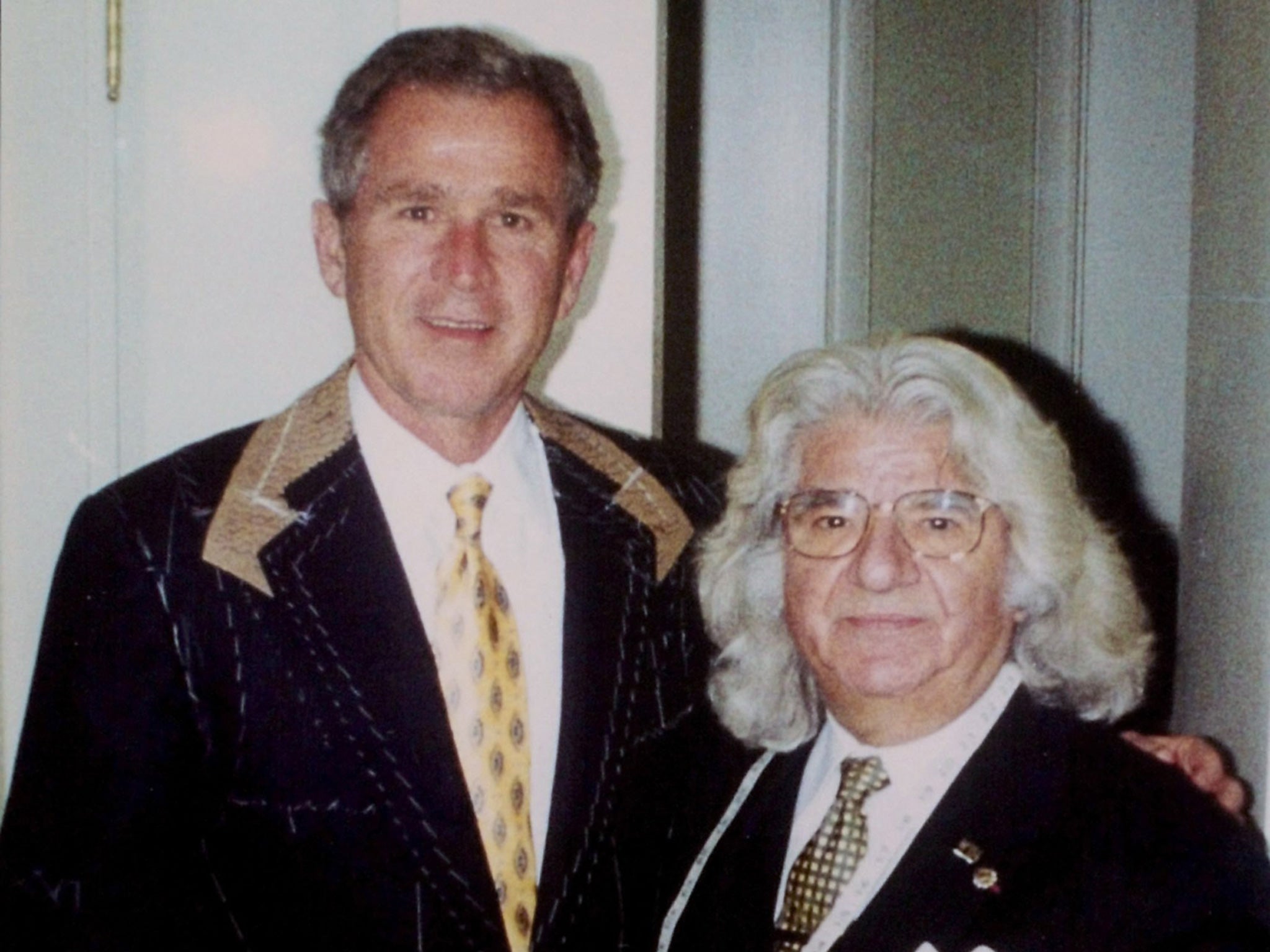 De Paris with George W Bush, who ‘proudly wore his suits,’ according to his spokesman