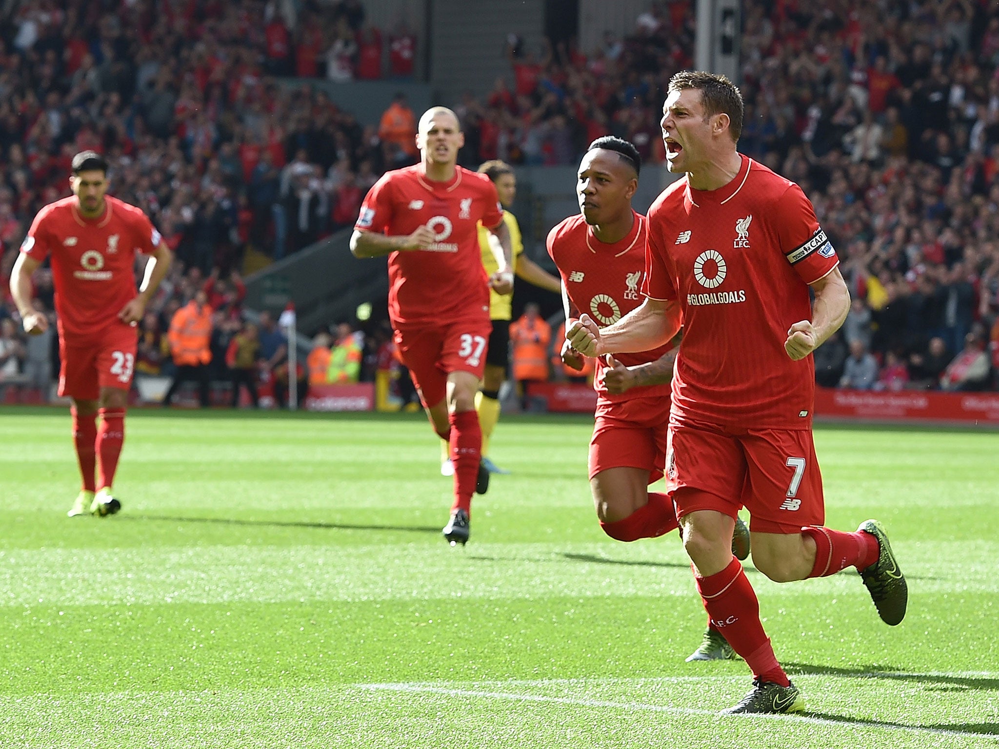 James Milner celebrates after netting the opener against Aston Villa