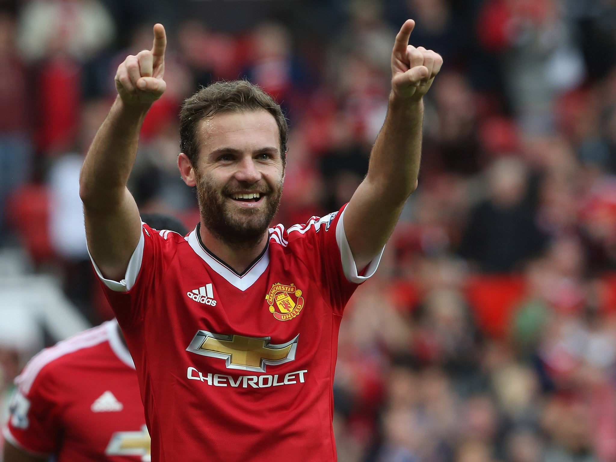 Juan Mata celebrates scoring United's third against Sunderland