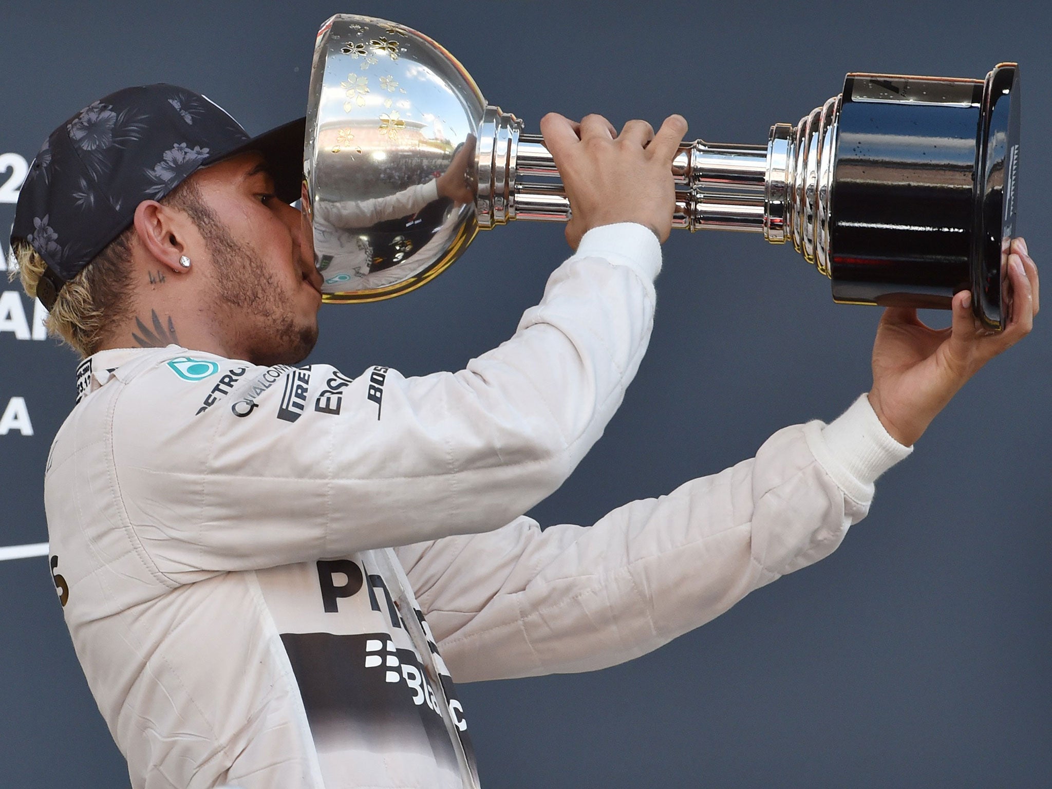 Lewis Hamilton celebrates his Japanese Grand Prix victory