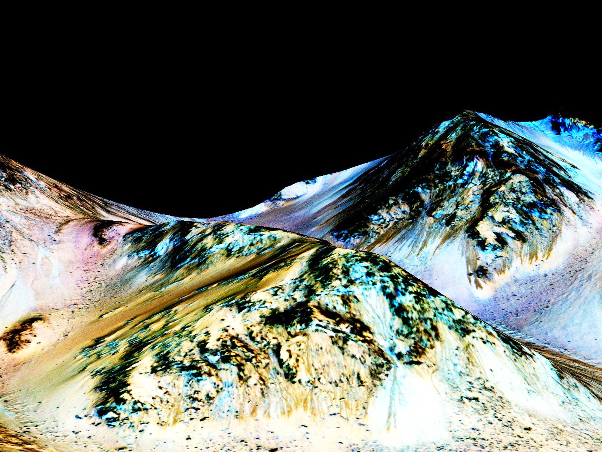 Dark, narrow, 100 meter-long streaks called recurring slope lineae flowing downhill on Mars, inferred to have been formed by contemporary flowing water