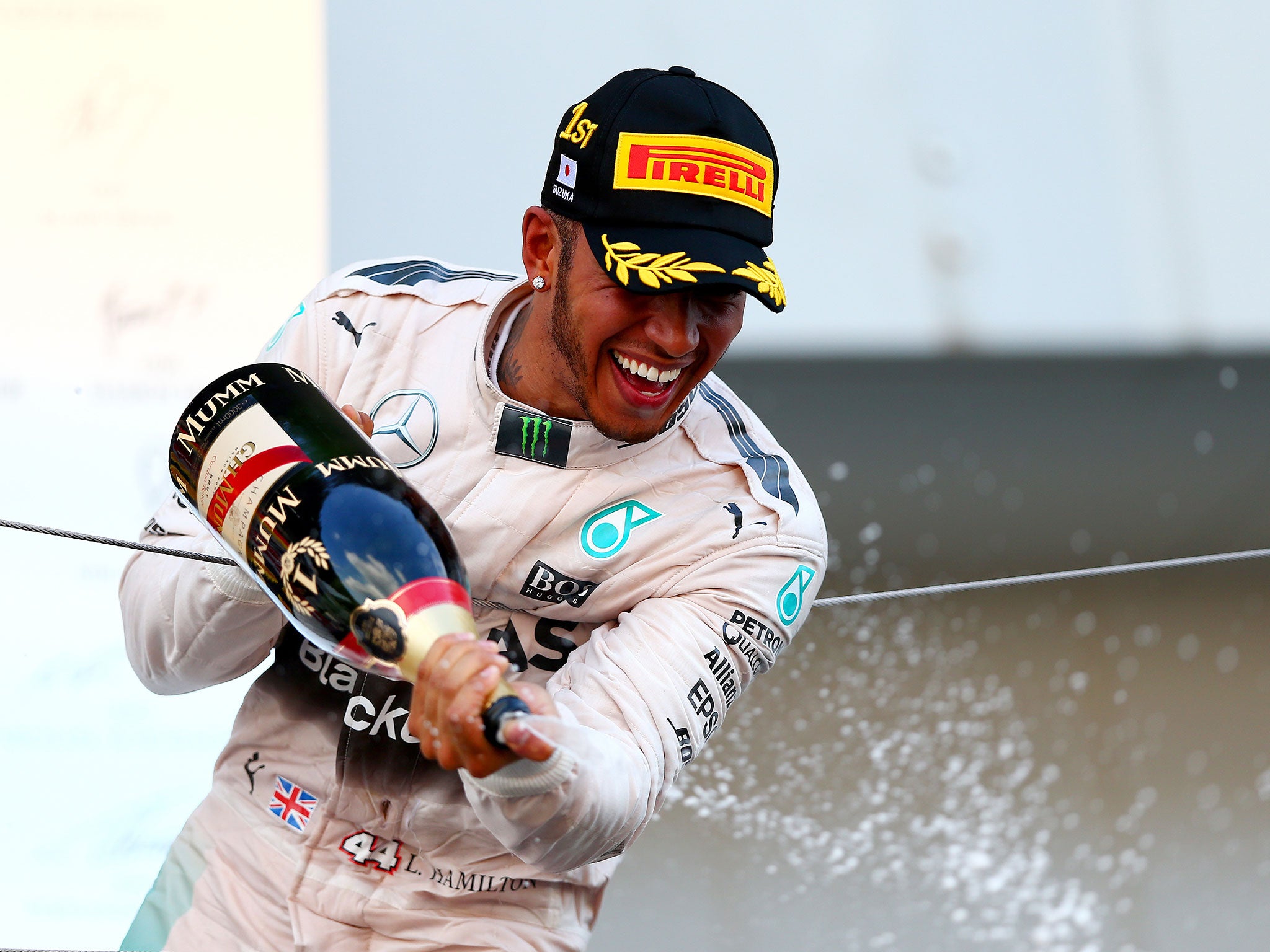 Lewis Hamilton celebrates his Japanese Grand Prix victory