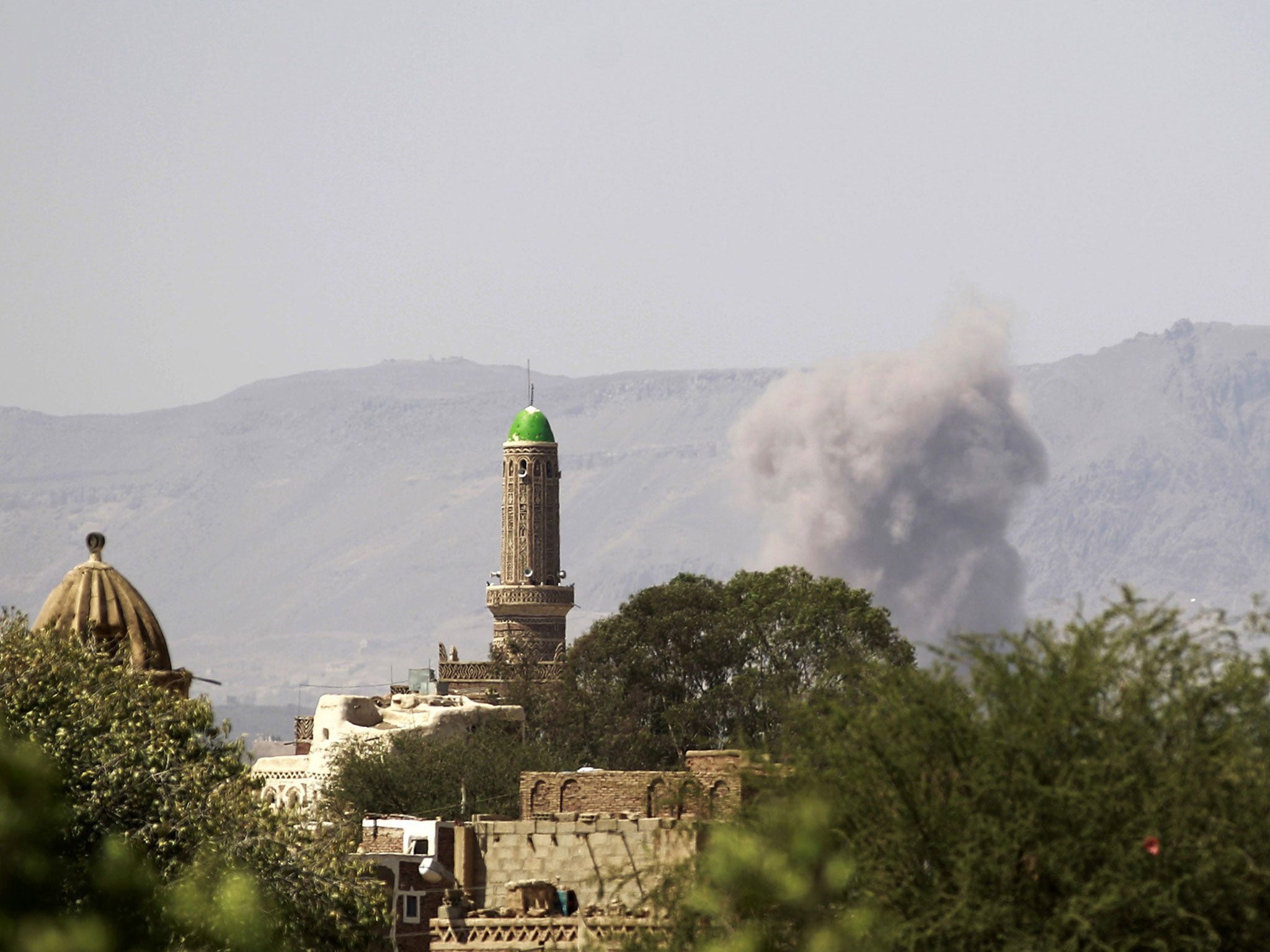 An air-strike by the Saudi-led coalition targeting an arms depot in the capital Sanaa on September 23, 2015. President Abedrabbo Mansour Hadi flew in to war-ravaged Yemen's second city of Aden after six months in exile in Saudi Arabia