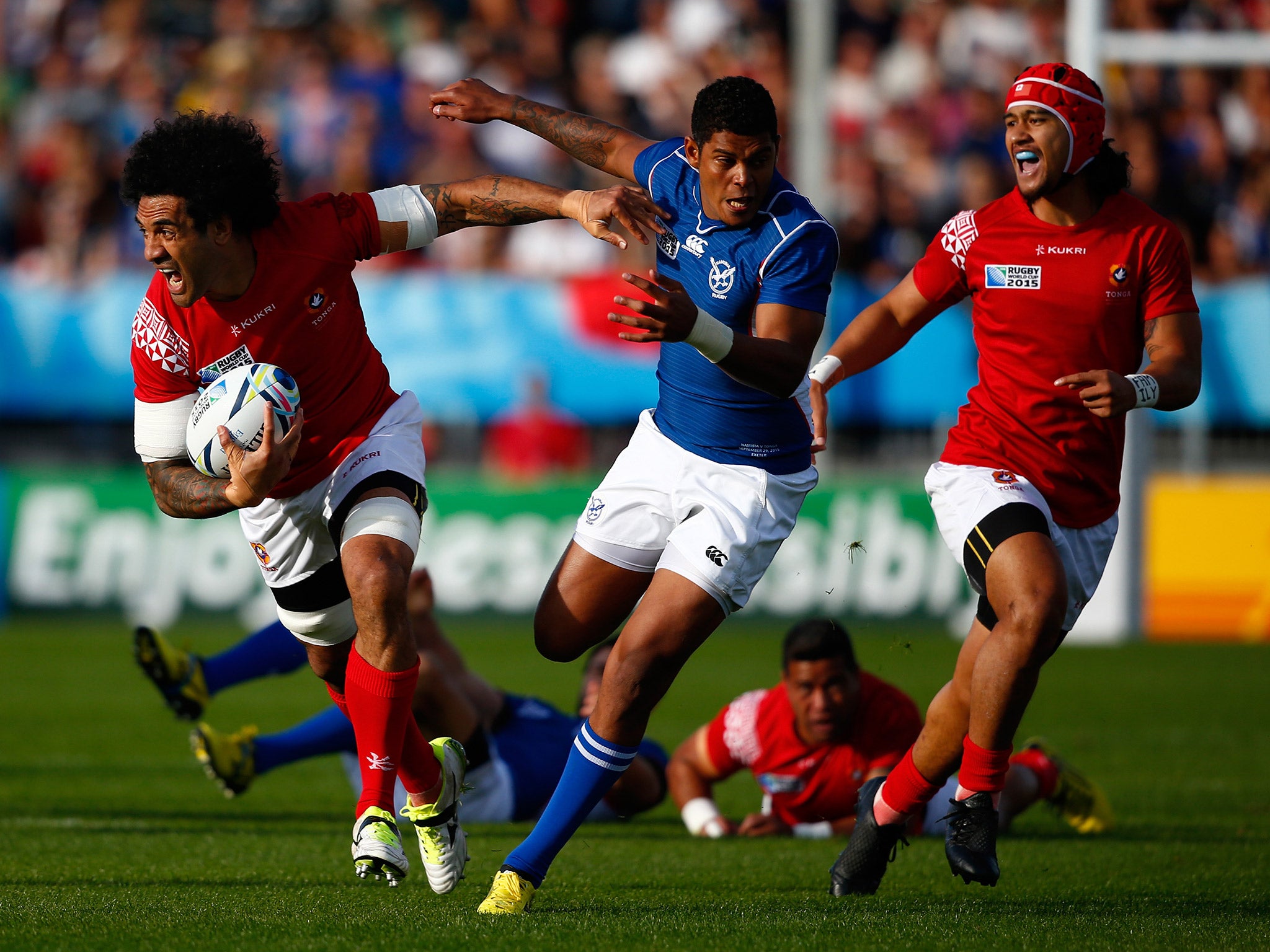 Tonga's Hale T-Pole runs at the Nambian defence