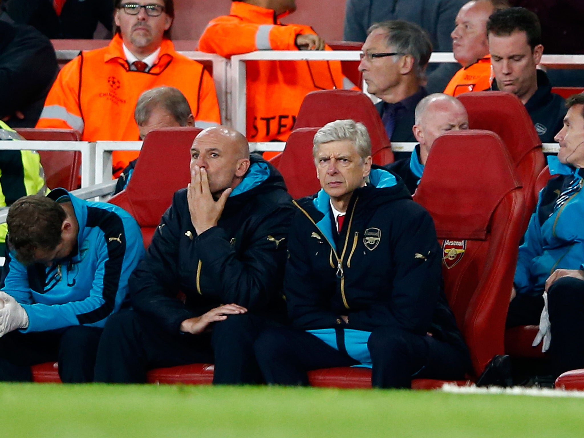 Arsene Wenger looks on from the dugout