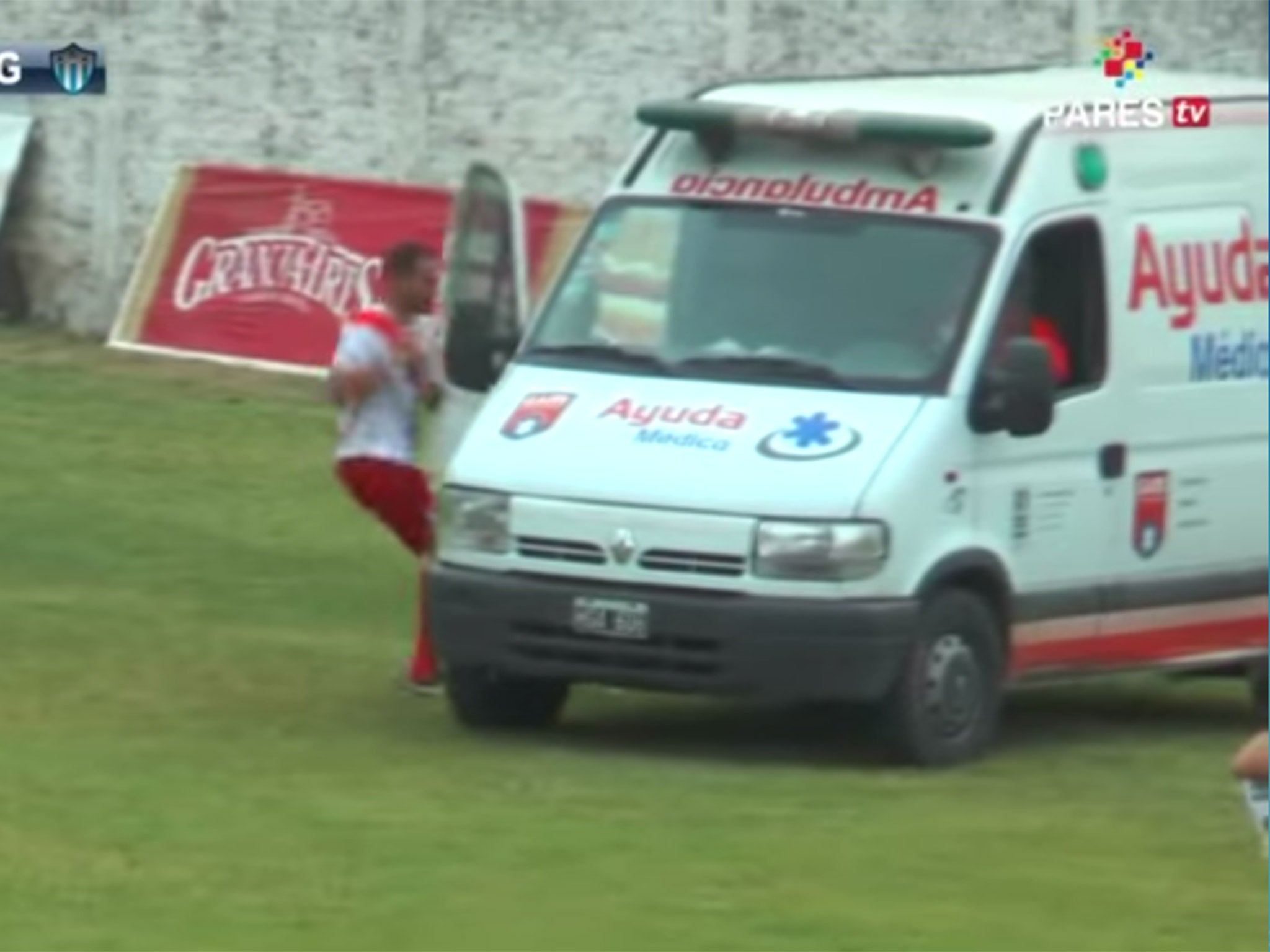 Gorosito and a teammate climbing into the vehicle