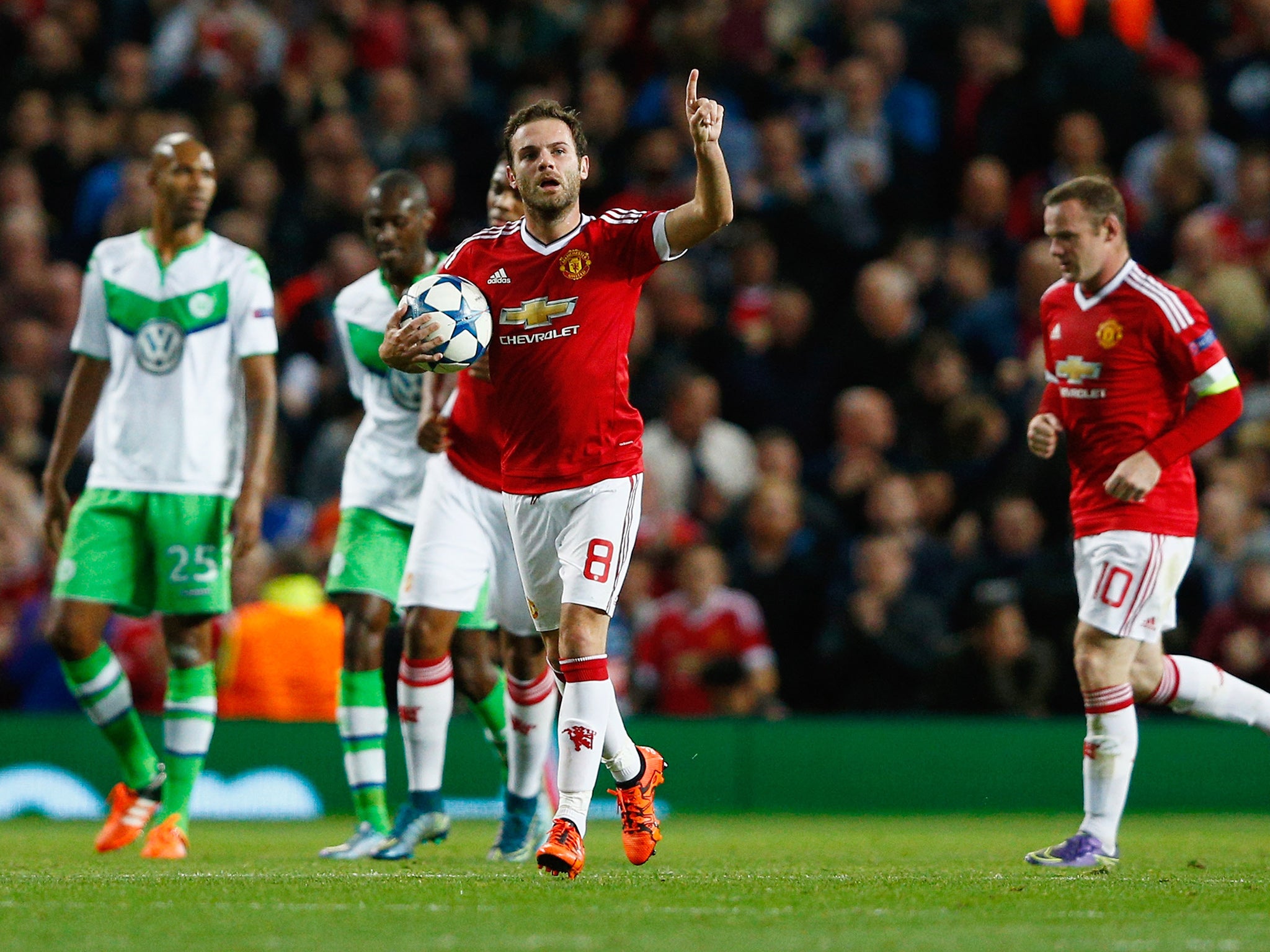 Juan Mata celebrates his penalty