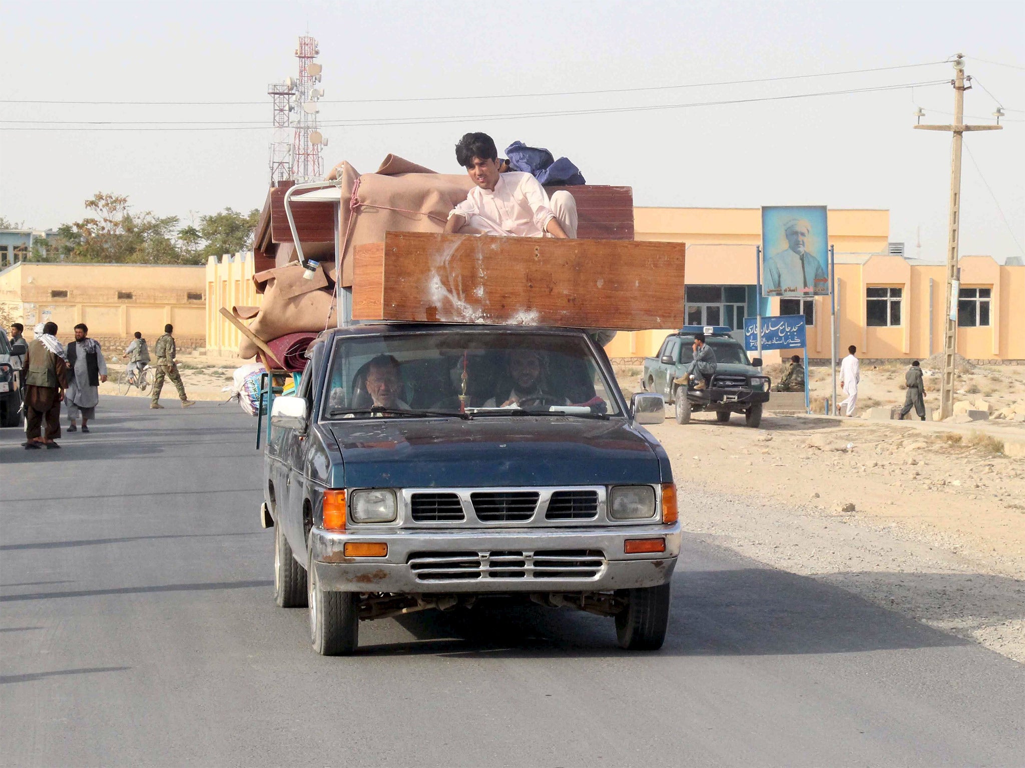 Kunduz residents flee their homes in the wake of the invasion