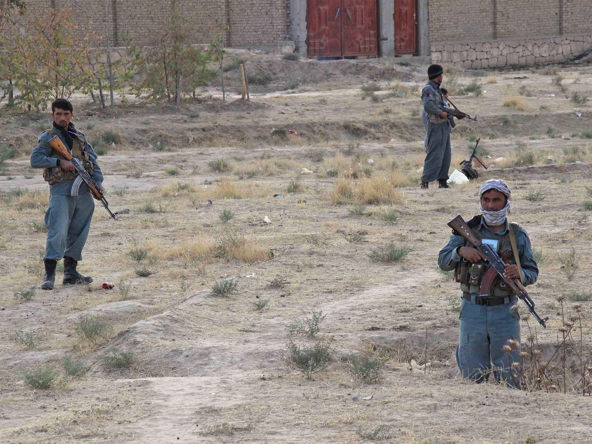 Afghan security personnel keeping watch on the outskirts of Kunduz (Getty)