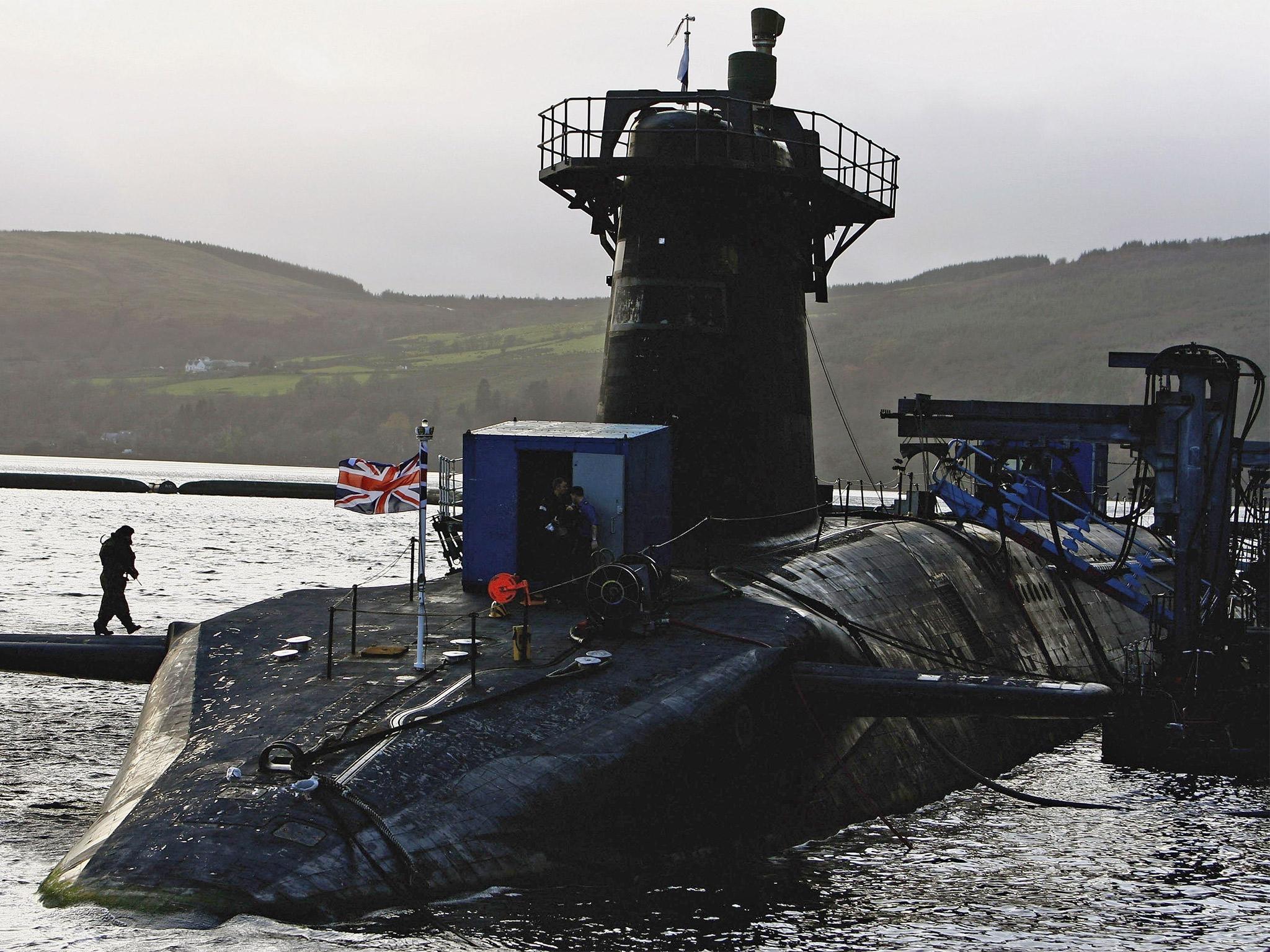 HMS Vanguard sits in dock at Faslane Submarine base on the river Clyde in Helensburgh, Scotland