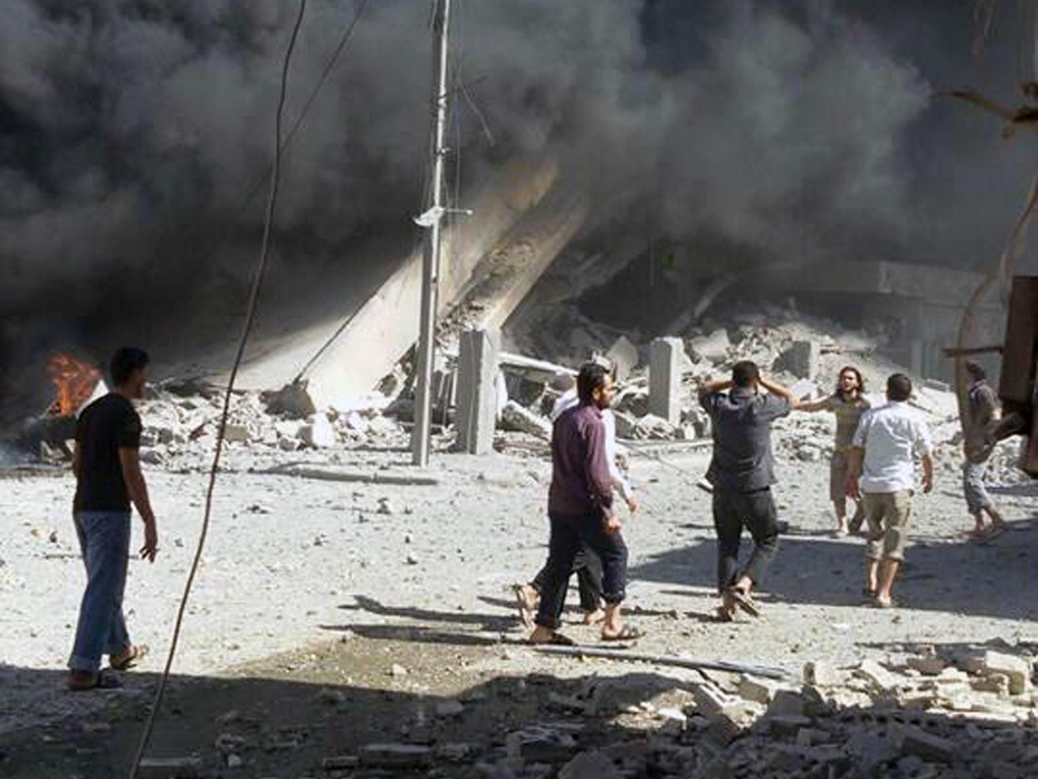 The aftermath of an airstrike in Talbiseh, Syria