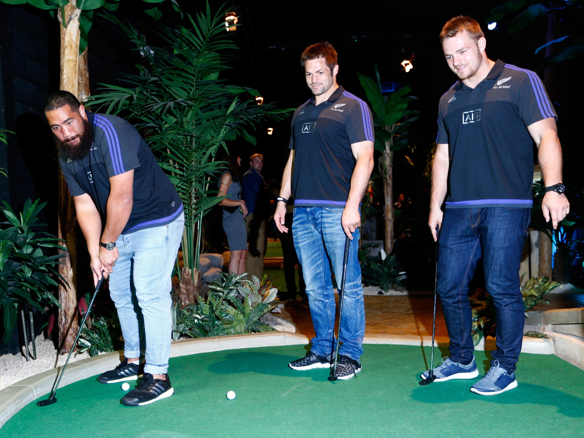 Charlie Faumuina, Richie McCaw and Sam Cane enjoy a spot a crazy golf