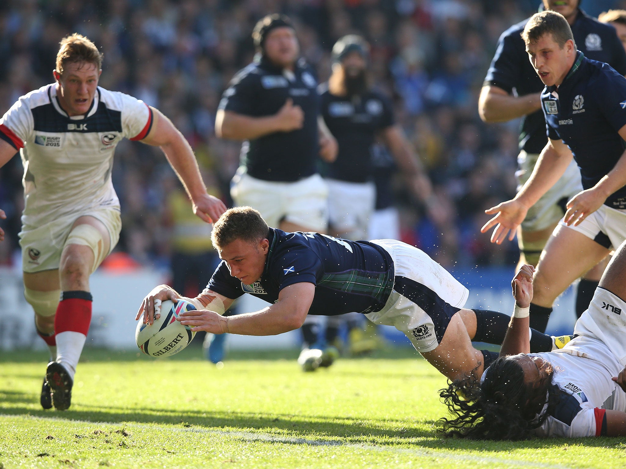 Duncan Weir scores a try for Scotland against the USA