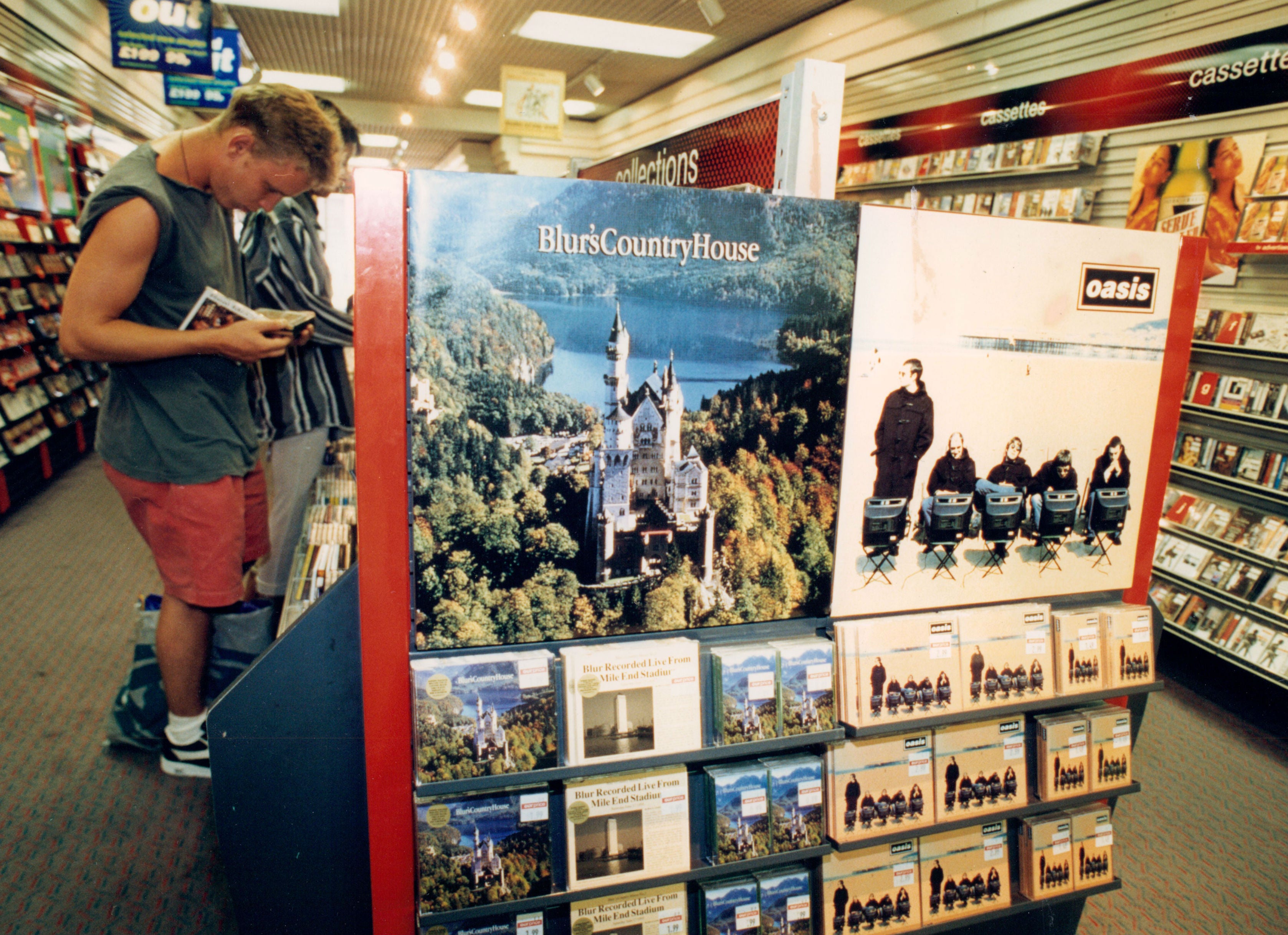 The Battle of Britpop displayed in a music shop in 1995