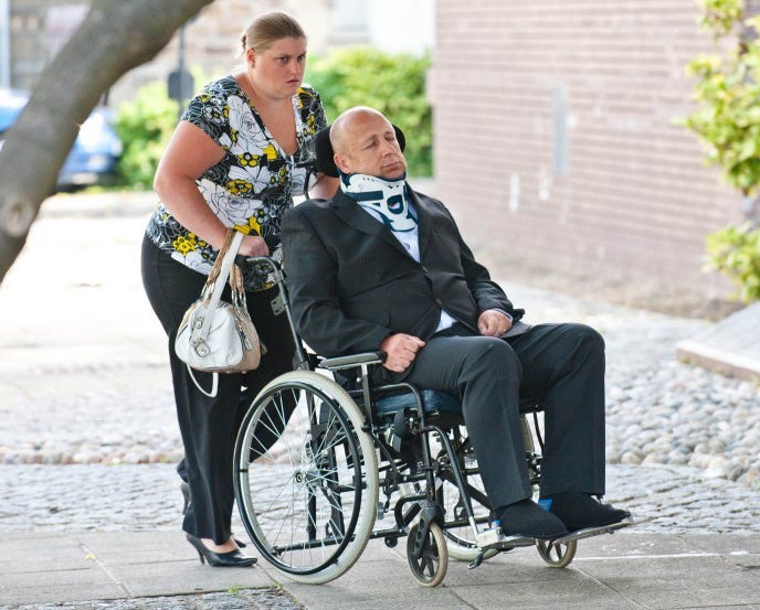 Helen and Alan Knight at an earlier court appearance where Alan pretended to be unconscious