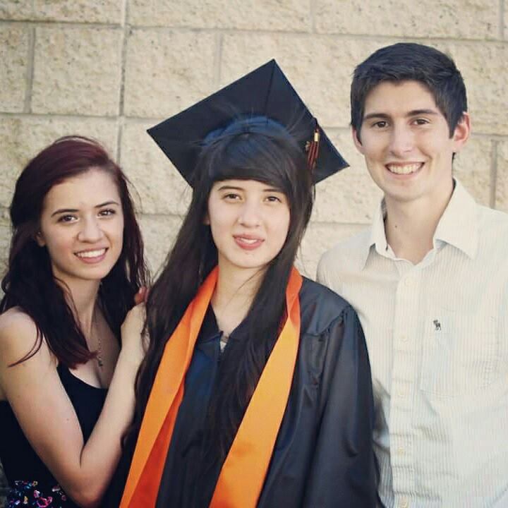 Lucero Alcaraz, middle, with her older sister Maria, left.