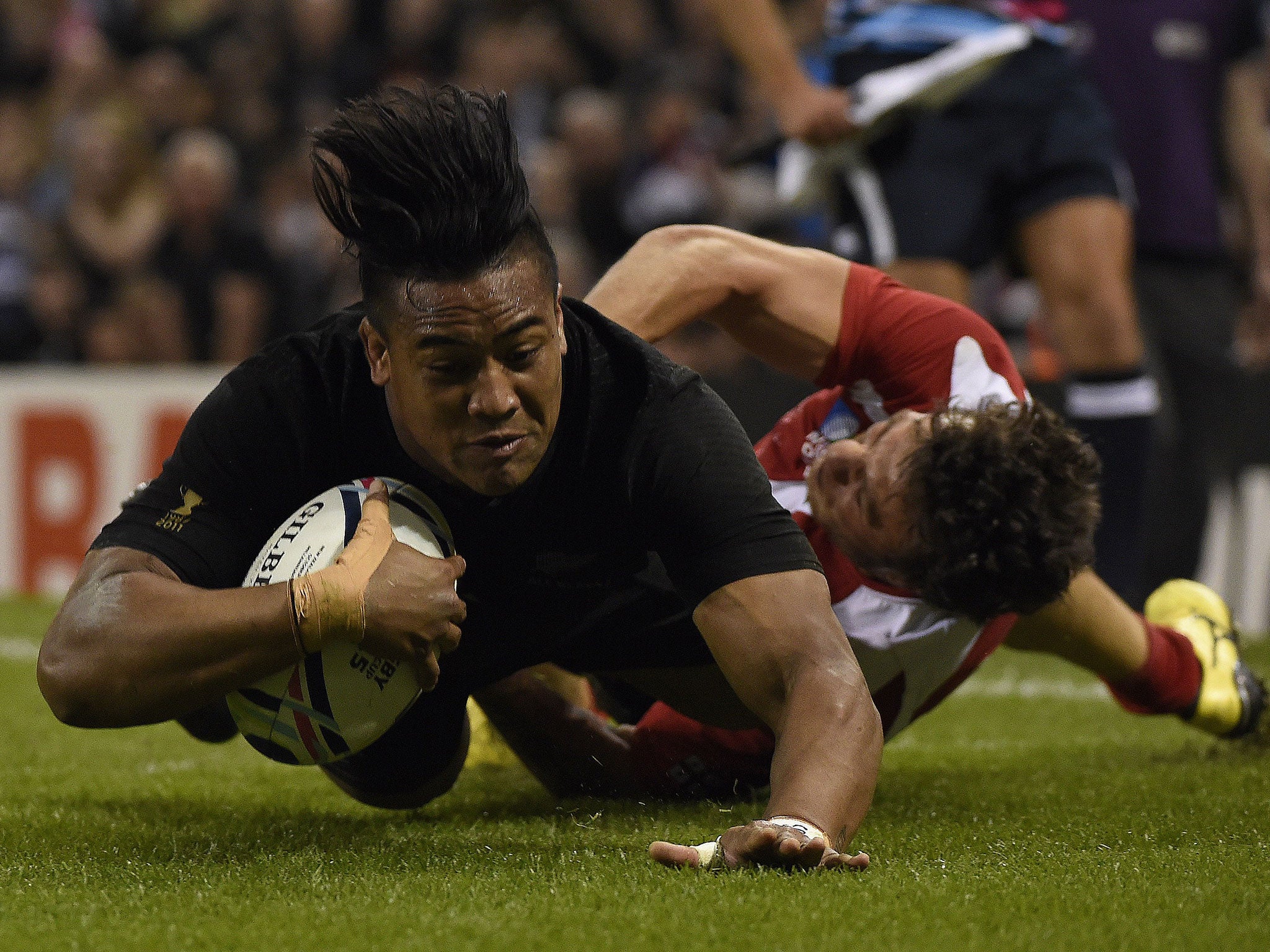 Julian Savea scores one of his three tires against Georgia