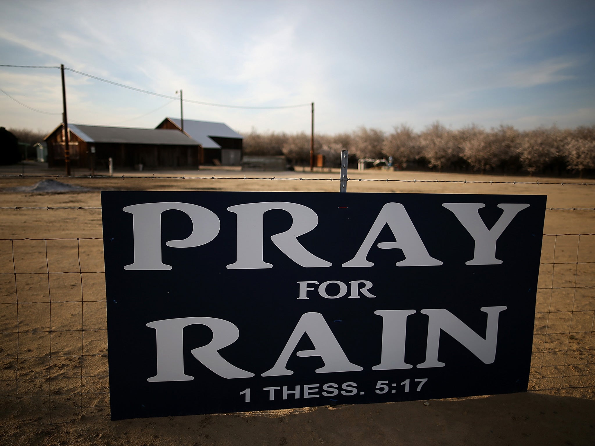 A sign posted near an almond farm on 25 February 2014 in Turlock, California