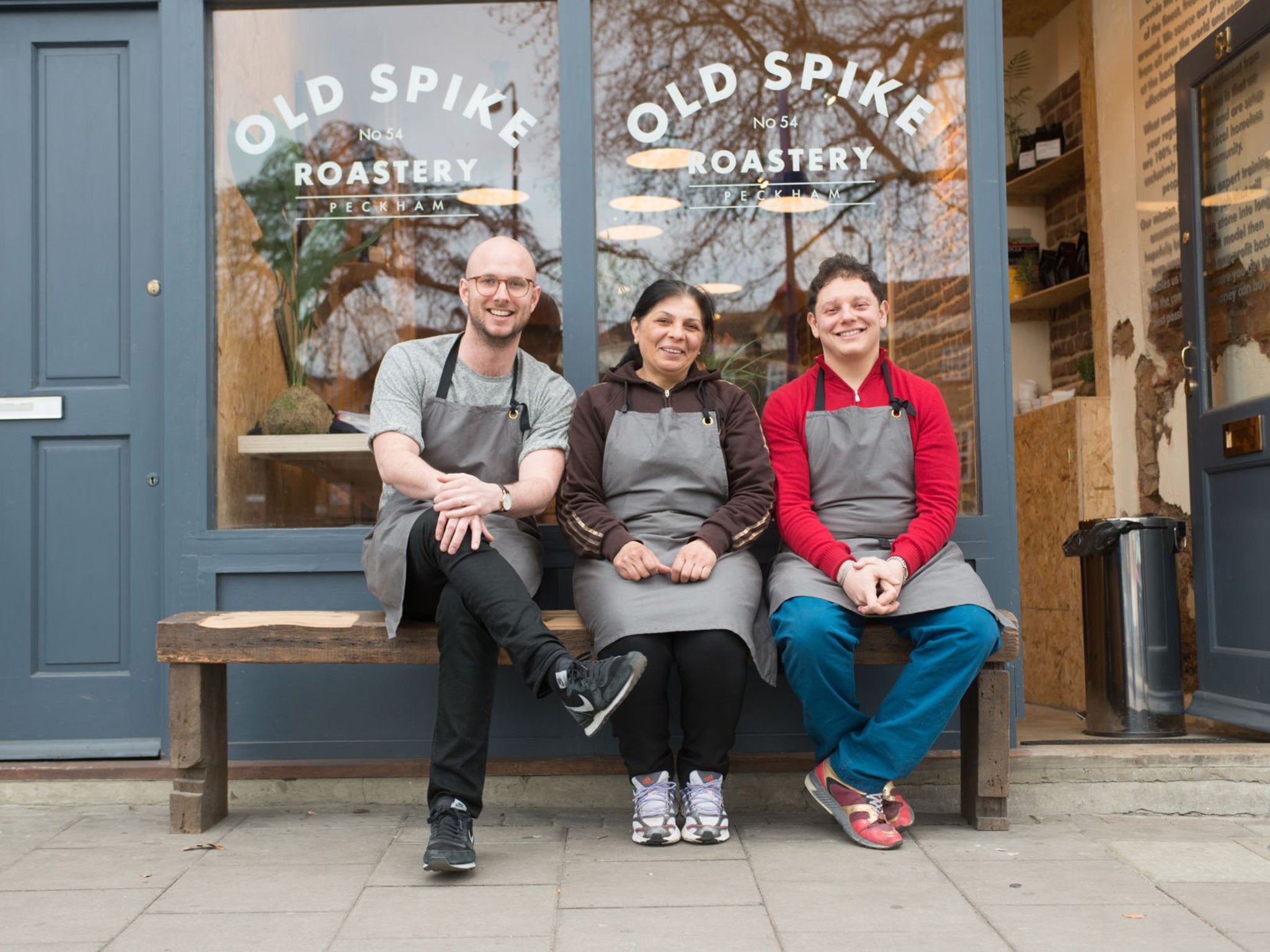 Richard Robinson, Lucy (c) and Cemel Ezel outside the Old Spike Roastery