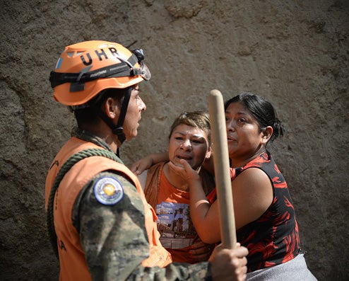 More than 500 rescue workers and family members have been desperately combing through the rubble