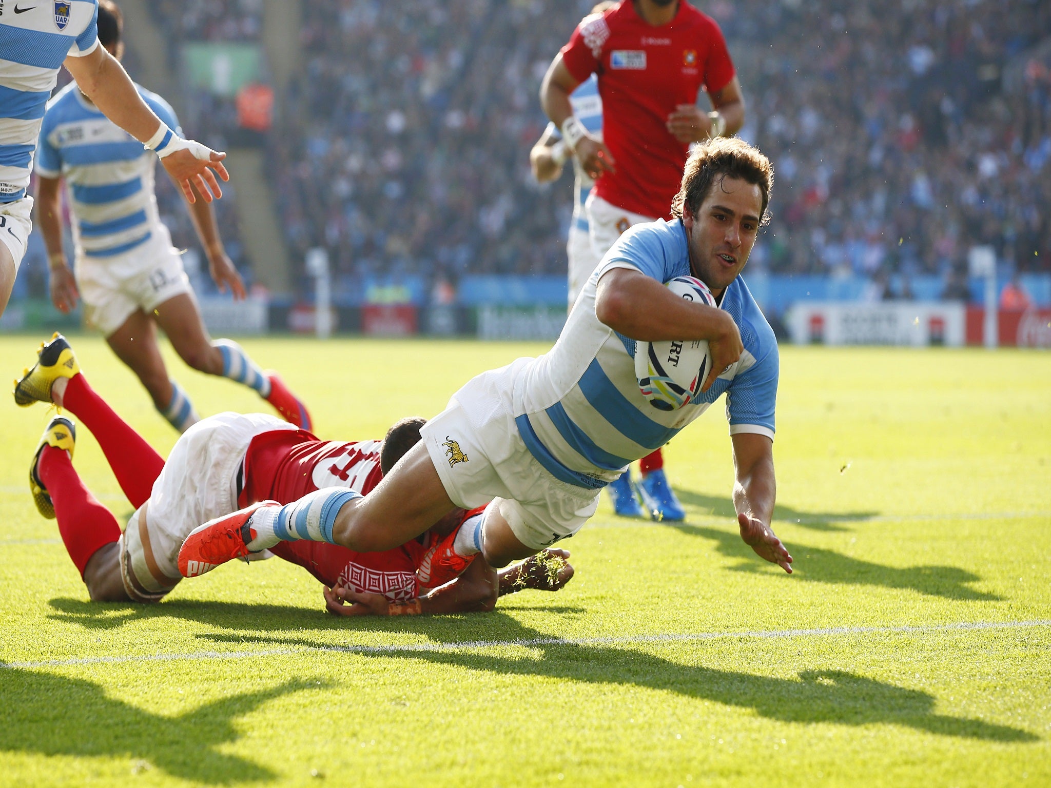 Nicolas Sanchez scores a try for Argentina against Tonga